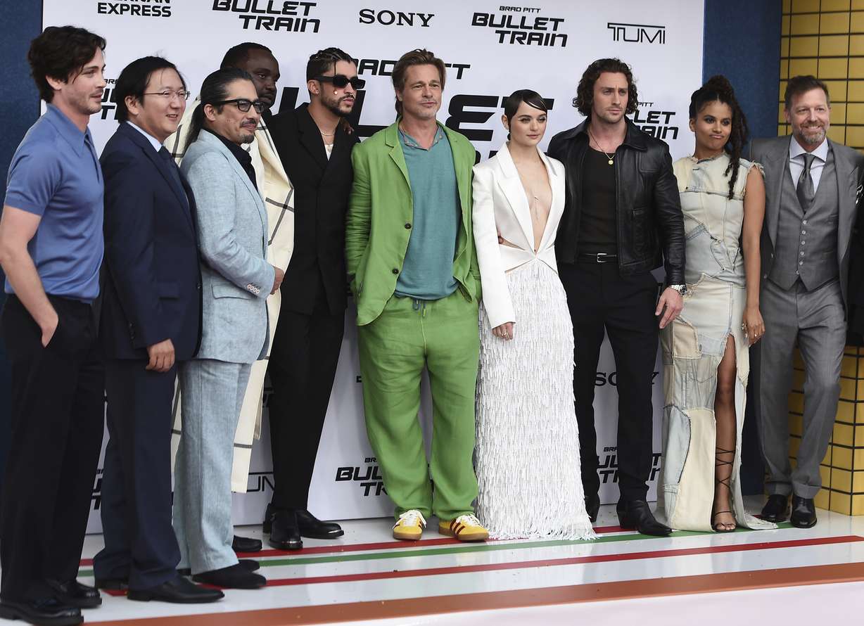 The cast of "Bullet Train" pose on the red carpet at the film's premiere on Aug. 1, at the Regency Village Theatre in Los Angeles. Pictured from left is Logan Lerman, Masi Oka, Hiroyuki Sanada, Brian Tyree Henry, Bad Bunny, Brad Pitt, Joey King, Aaron Taylor-Johnson, Zazie Beetz and director David Leitch.