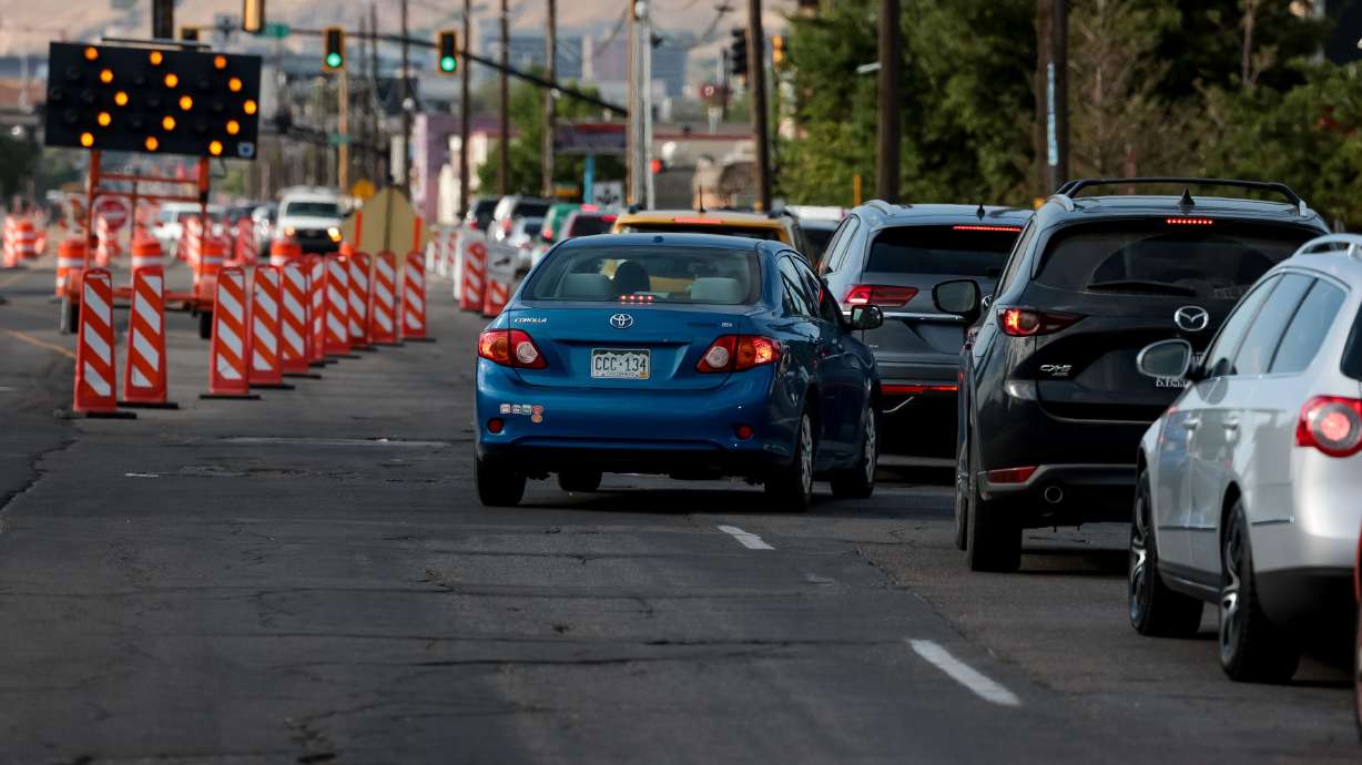 Cars merge due to a temporary lane closure for construction on 300 West in Salt Lake City on July 12. While a few cars chose to utilize the closing lane right until the cones, the vast majority merged into the other lane significantly farther back.