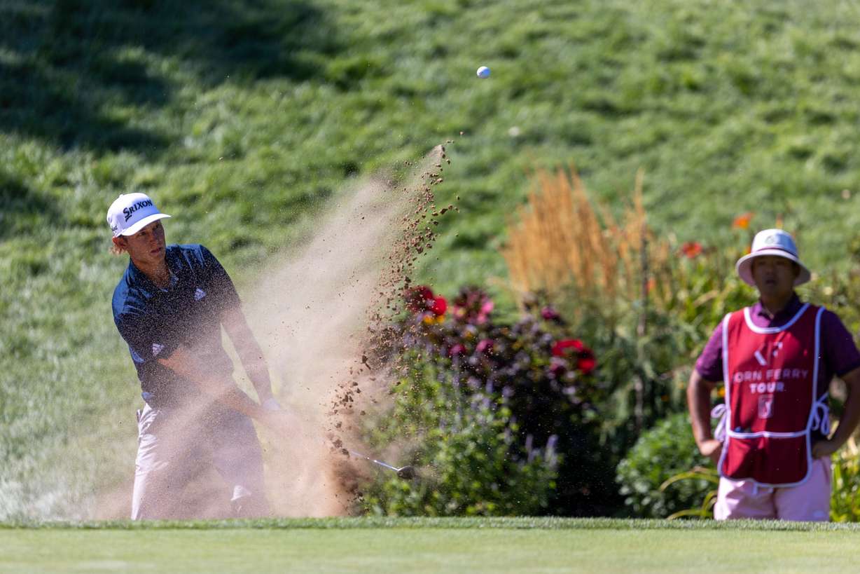 Former BYU golfer Peter Kuest hits a ball from a sand bunker at the Korn Ferry Tour’s 2022 Utah Championship golf tournament at the Oakridge Country Club in Farmington on Sunday, Aug. 7, 2022.
