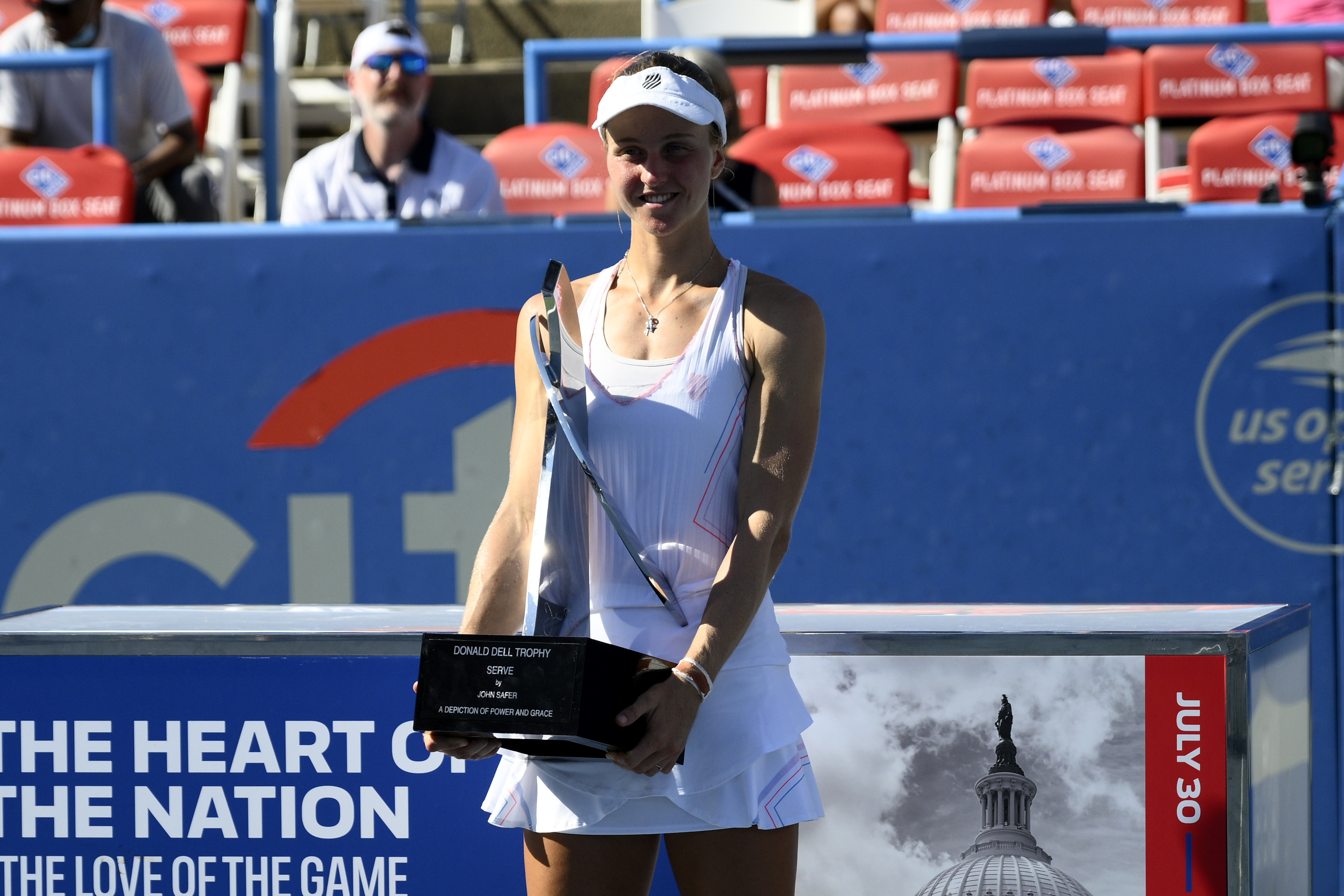 Liudmila Samsonova, of Russia, poses with the trophy after she won the final at the Citi Open tennis tournament against Kaia Kanepi, of Estonia, Sunday, Aug. 7, 2022, in Washington. 