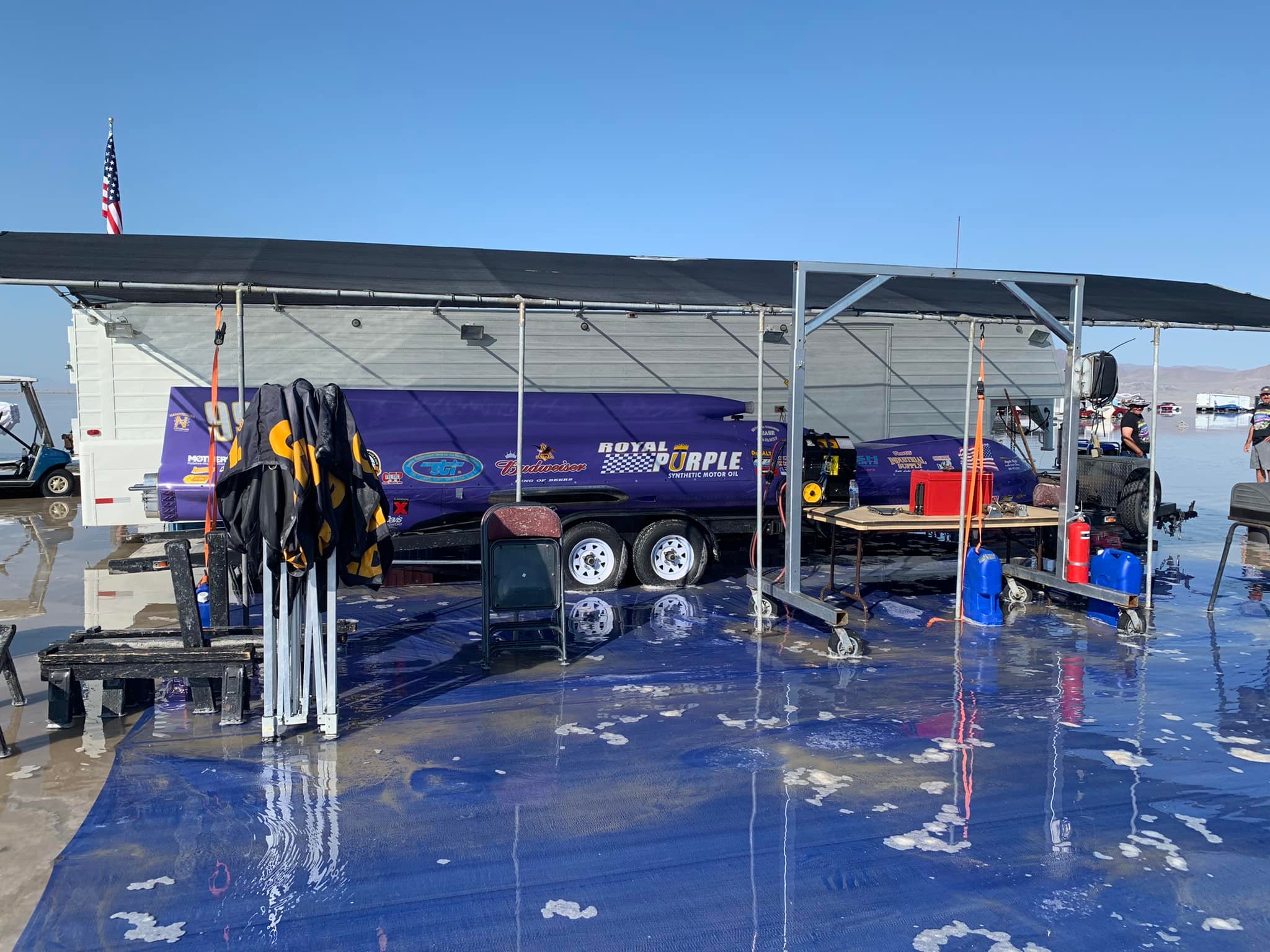 Rains flood the pit areas on the Bonneville Salt Flats over the weekend. This year's Speed Week was canceled because of rain that caused muddy conditions.