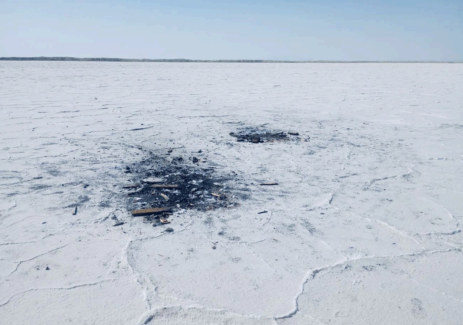 Debris from an abandoned campfire at the Bonneville Salt Flats on July 29, 2022.