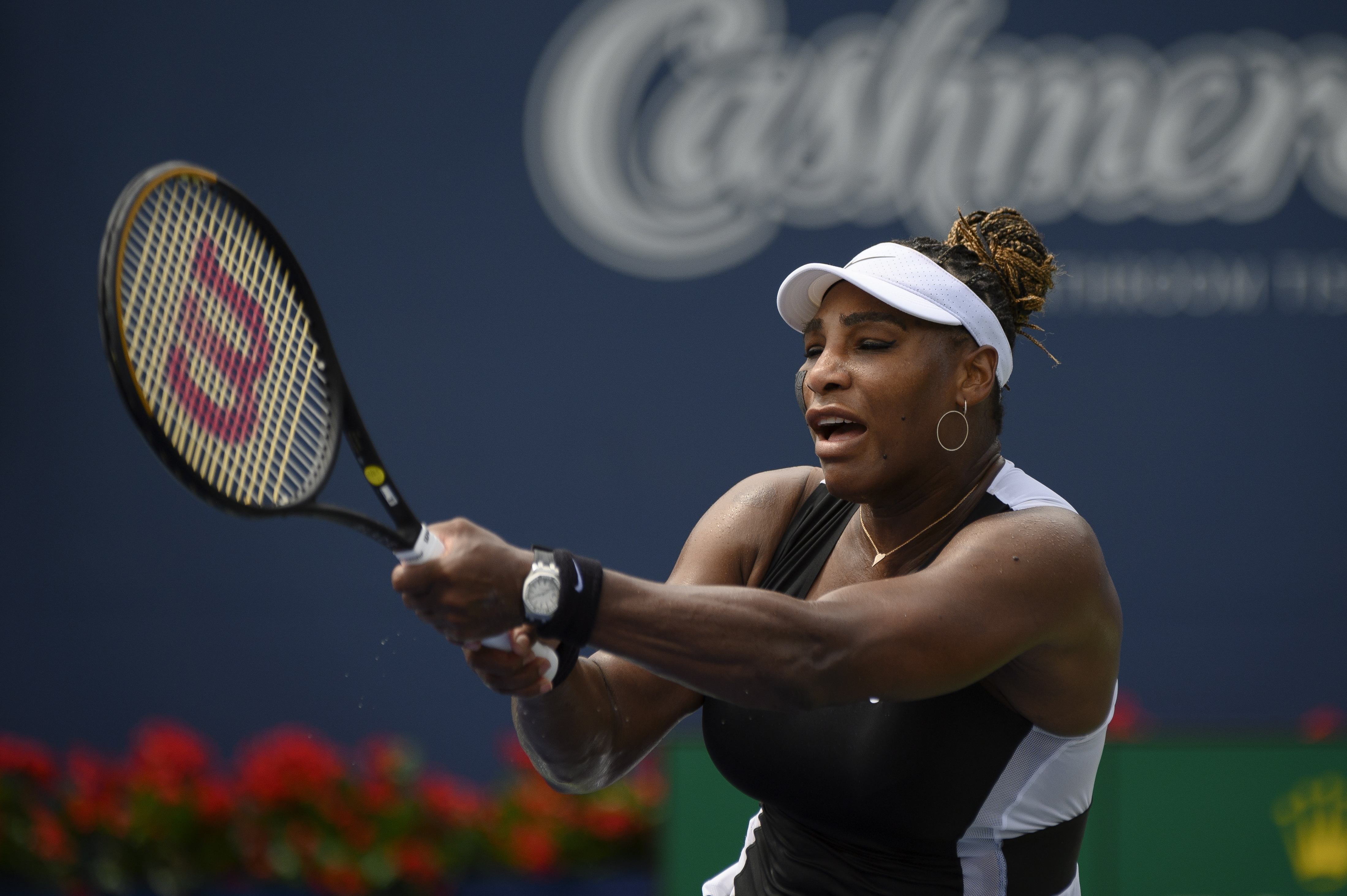 Serena Williams returns the ball during a match against Nuria Parrizas-Diaz, of Spain, during the National Bank Open tennis tournament in Toronto, Monday. Tuesday Williams says she is preparing to step away from tennis.
