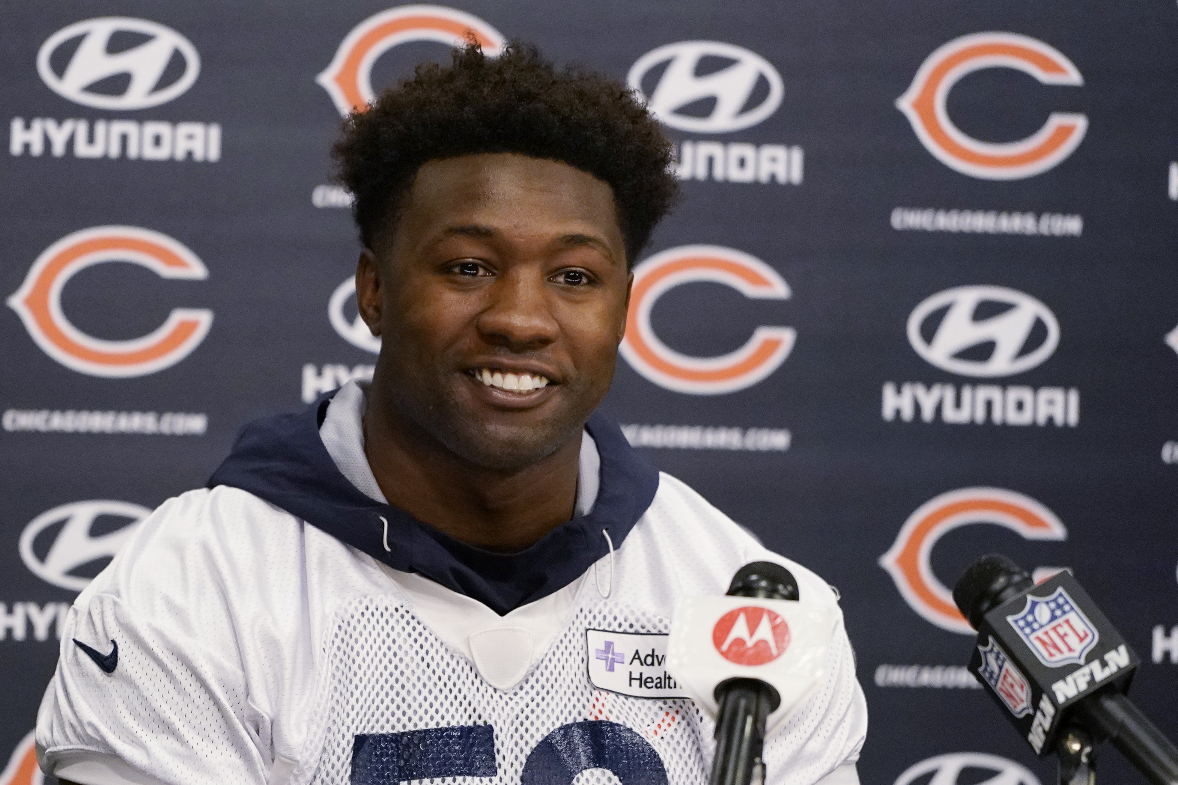 FILE - Chicago Bears linebacker Roquan Smith speaks at a news conference in Lake Firest, Ill., April 20, 2022. Smith is requesting a trade, saying the team has not negotiated in good faith for a contract extension. Smith, who does not have an agent, wrote Tuesday, Aug. 9, 2022 in a statement to NFL.com he has “officially” asked to be dealt and that it was “deeply painful.” He said he has been trying to negotiate an extension since April and accused the organization of trying to take advantage of him. 