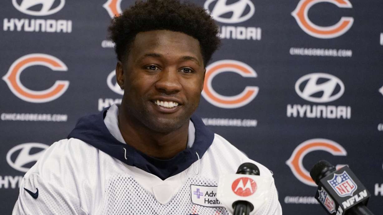FILE - Chicago Bears linebacker Roquan Smith speaks at a news conference in Lake Firest, Ill., April 20, 2022. Smith is requesting a trade, saying the team has not negotiated in good faith for a contract extension. Smith, who does not have an agent, wrote Tuesday, Aug. 9, 2022 in a statement to NFL.com he has “officially” asked to be dealt and that it was “deeply painful.” He said he has been trying to negotiate an extension since April and accused the organization of trying to take advantage of him.