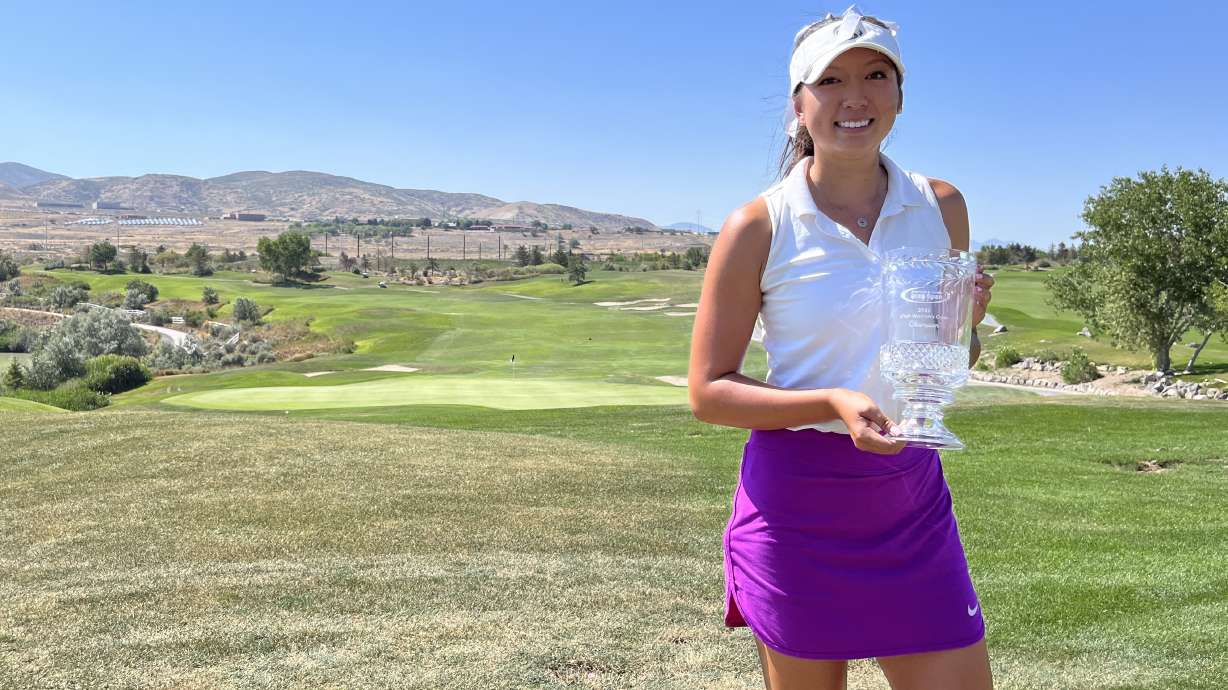 Sacramento State rising senior Tess Blair, a Bingham High alum, poses for photos the trophy of the Utah Women's Open, Tuesday, Aug. 9, 2022 at Thanksgiving Point Golf Club in Lehi.
