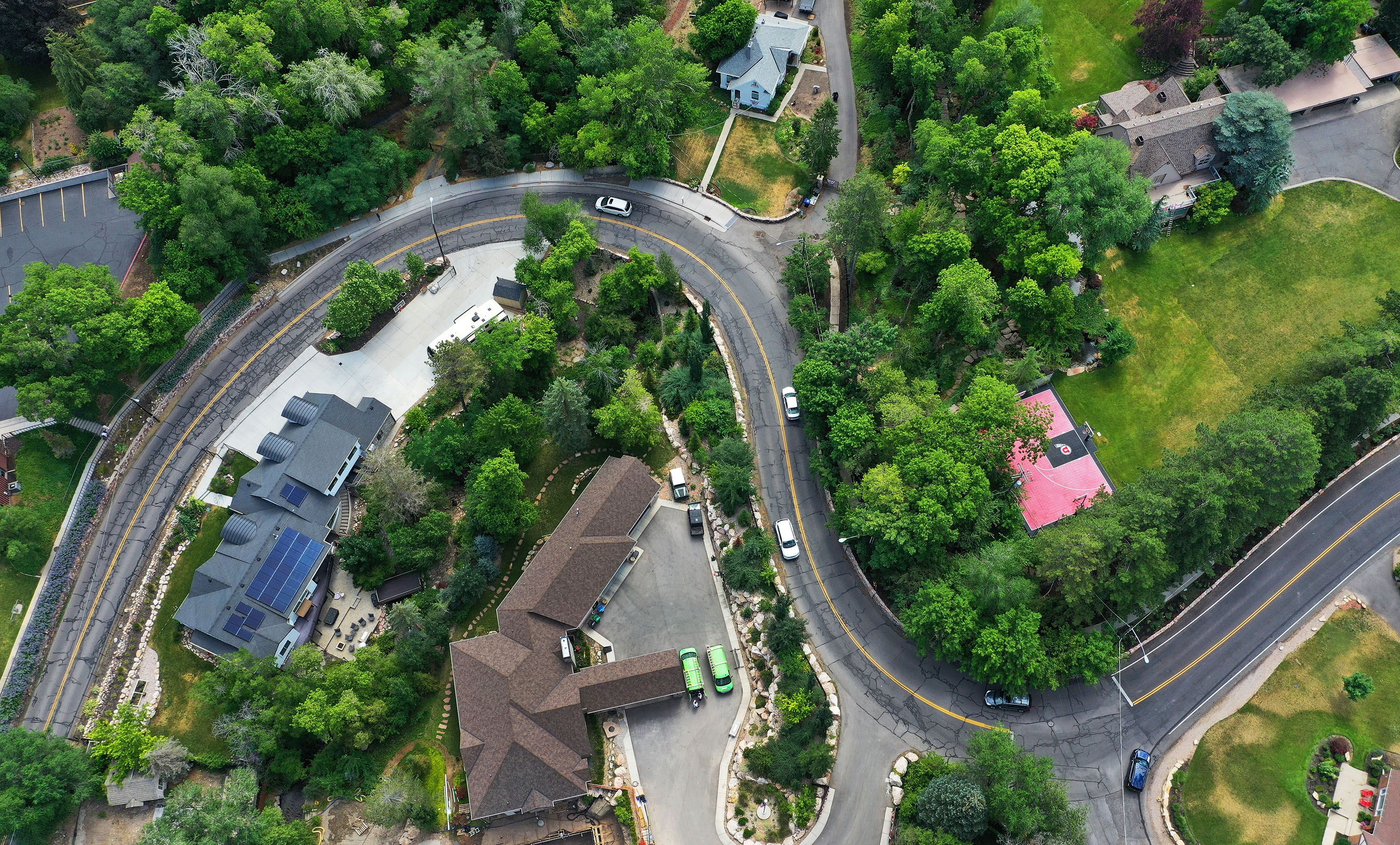 Motorists travel in Millcreek on July 13. Rising property values in Utah have led to property tax hikes as well.