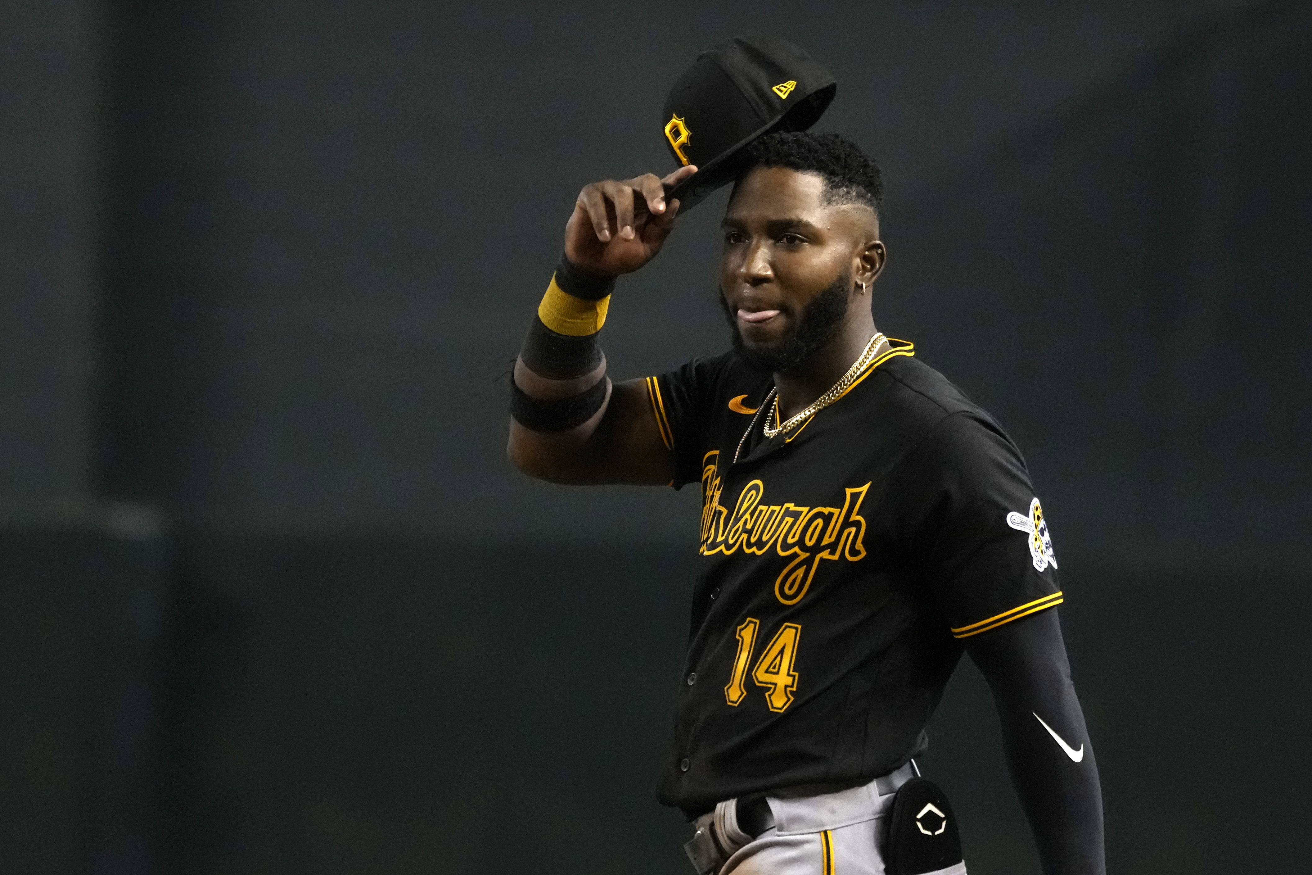 Pittsburgh Pirates' Rodolfo Castro reacts after making the last out against the Arizona Diamondbacks in the eighth inning of a baseball game, Tuesday, Aug. 9, 2022, in Phoenix. Called up from Triple-A Indianapolis before the game, Castro slid headfirst into third in the fourth inning against the Diamondbacks and had his phone fly out of his back pocket. 