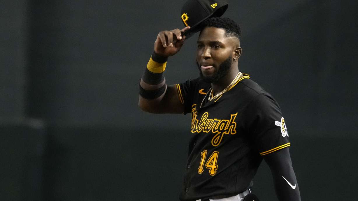 Pittsburgh Pirates' Rodolfo Castro reacts after making the last out against the Arizona Diamondbacks in the eighth inning of a baseball game, Tuesday, Aug. 9, 2022, in Phoenix. Called up from Triple-A Indianapolis before the game, Castro slid headfirst into third in the fourth inning against the Diamondbacks and had his phone fly out of his back pocket.