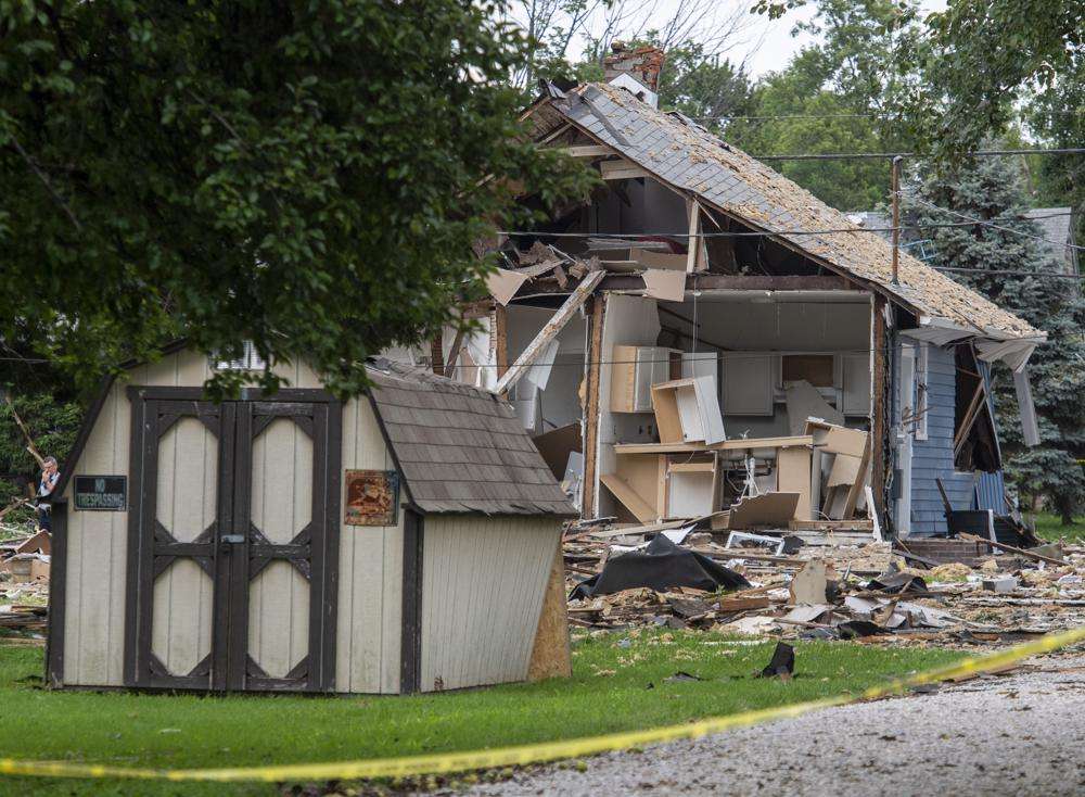 Emergency crews respond to a house explosion in the 1000 block of North Weinbach Avenue in Evansville, Ind., Wednesday. Several people were killed Wednesday when a house exploded in the southern Indiana city of Evansville, authorities said.