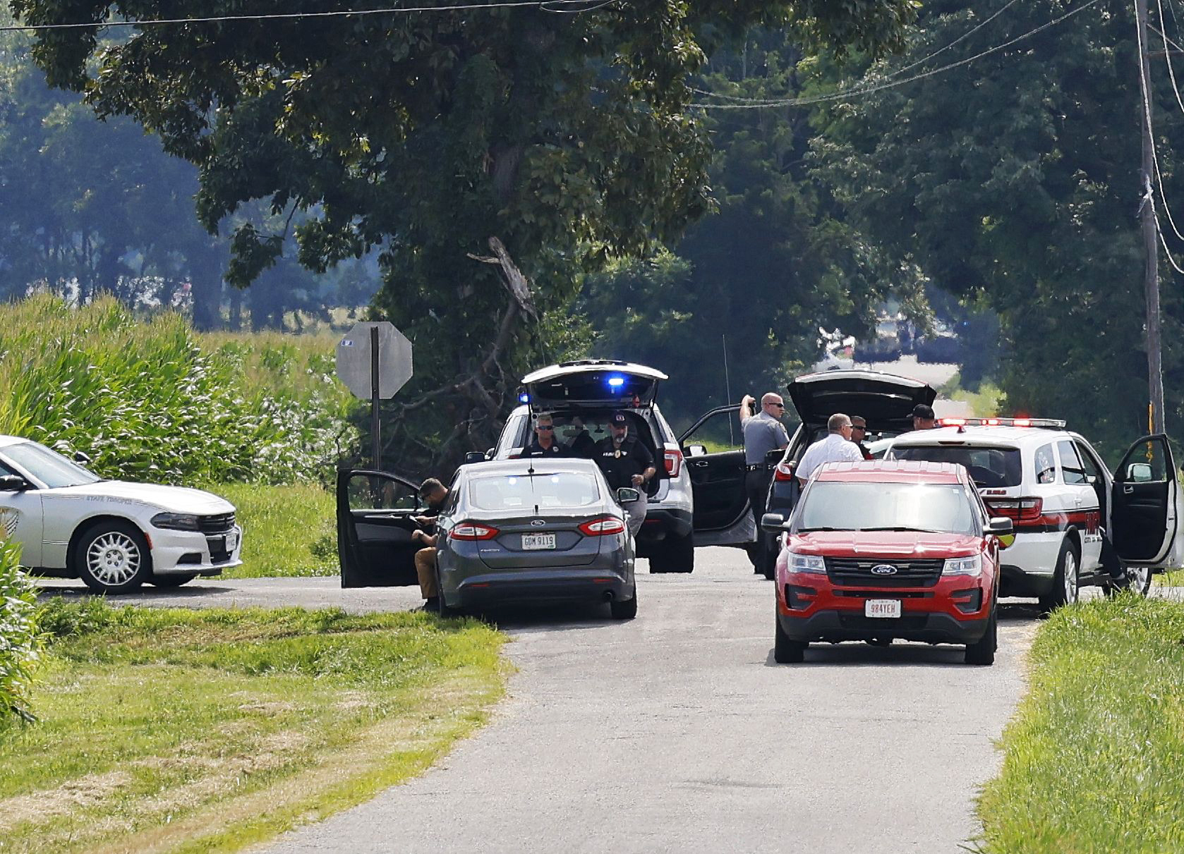 The area near Center and Smith roads was closed for hours during a standoff Thursday, in Clinton County, Ohio, after an armed man tried to breach the FBI's Cincinnati office and fled north on the highway. The man was shot and killed by police after he fled.