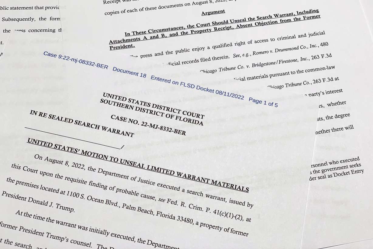 The motion by the Justice Department to the U.S. District Court South District of Florida to unseal the search warrant the FBI received before searching the Florida estate of former President Donald Trump, is photographed Thursday.