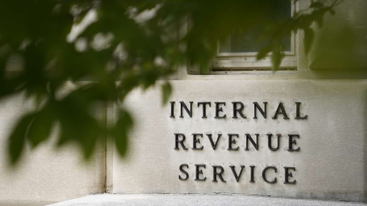 A sign is displayed outside the Internal Revenue Service building on May 4, 2021, in Washington. Utah’s four Republican congressmen are expected Friday to vote against the Democrats’ Inflation Reduction Act, which aims to address taxes, health care spending and climate change.