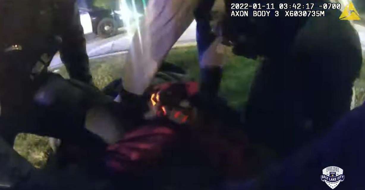Salt Lake police officers restrain a woman in body camera video from Jan. 11 near 900 North and 400 West in Salt Lake City. Megan Joyce Mohn's death has since been ruled a homicide and is under investigation.