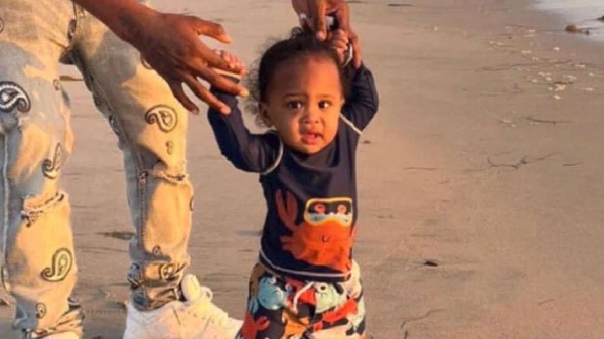 Police say they are looking for an 18-month-old boy whose parents "fled the state" after the father was suspected to be involved in the fatal shooting of a man during an alleged robbery attempt in May.