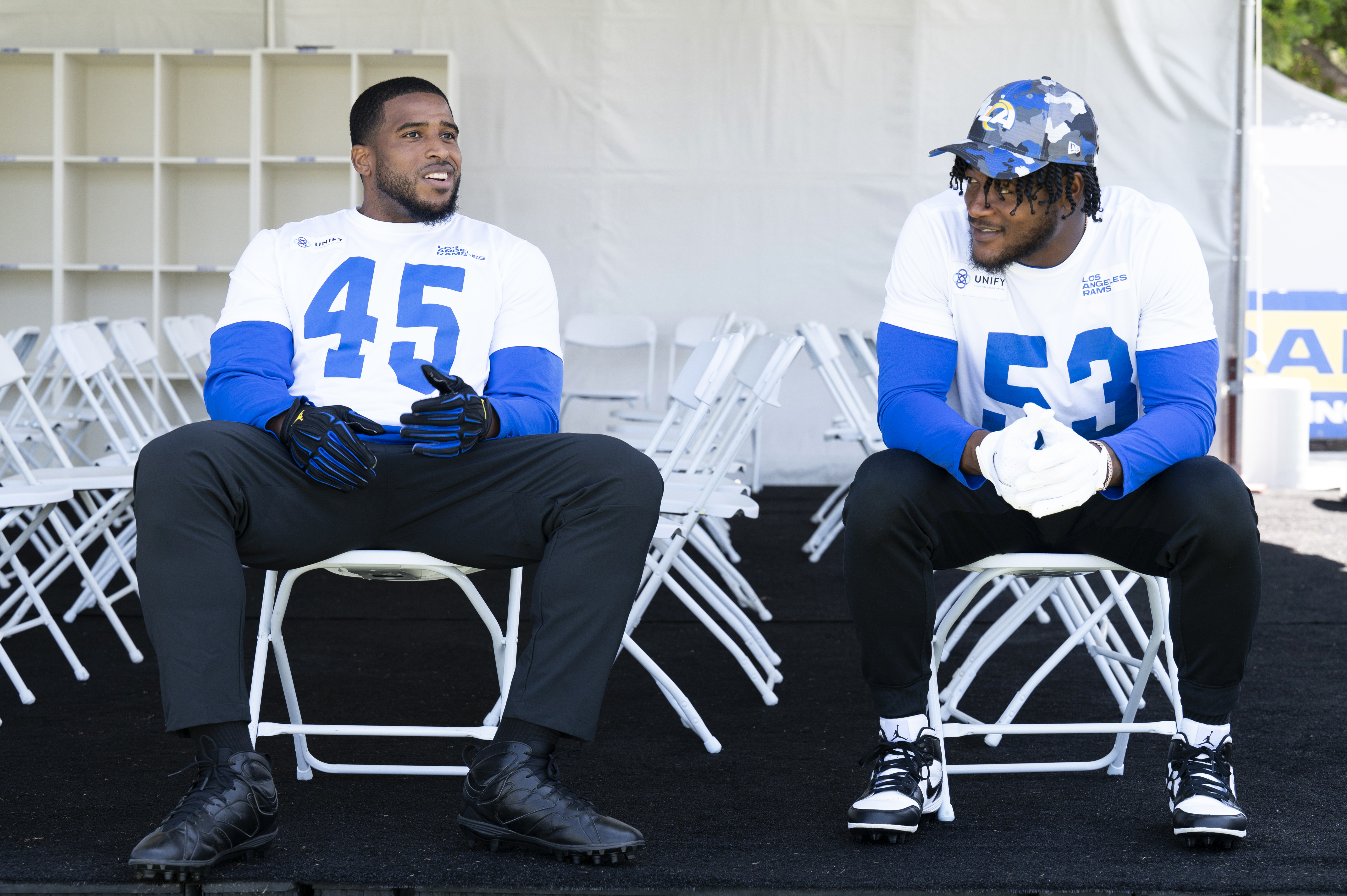 Los Angeles Rams linebacker Bobby Wagner chats with linebacker Ernest Jones during NFL football practice Tuesday, July 26, 2022, in Irvine, Calif. 