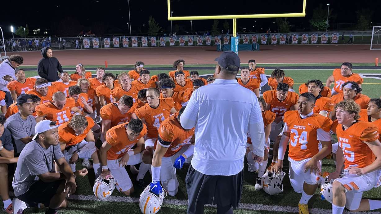 Timpview coach Donny Atuaia meets with his team after a 31-10 win over Lone Peak, Friday, Aug. 12, 2022 at Provo High School in Week 1 of the 2022 high school football season.