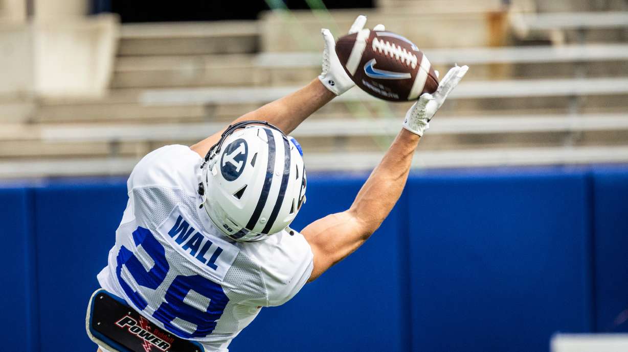 BYU receiver Tanner Wall catches a pass during the Cougars' first scrimmage of fall camp, Saturday, Aug. 13, 2022 at LaVell Edwards Stadium in Provo.