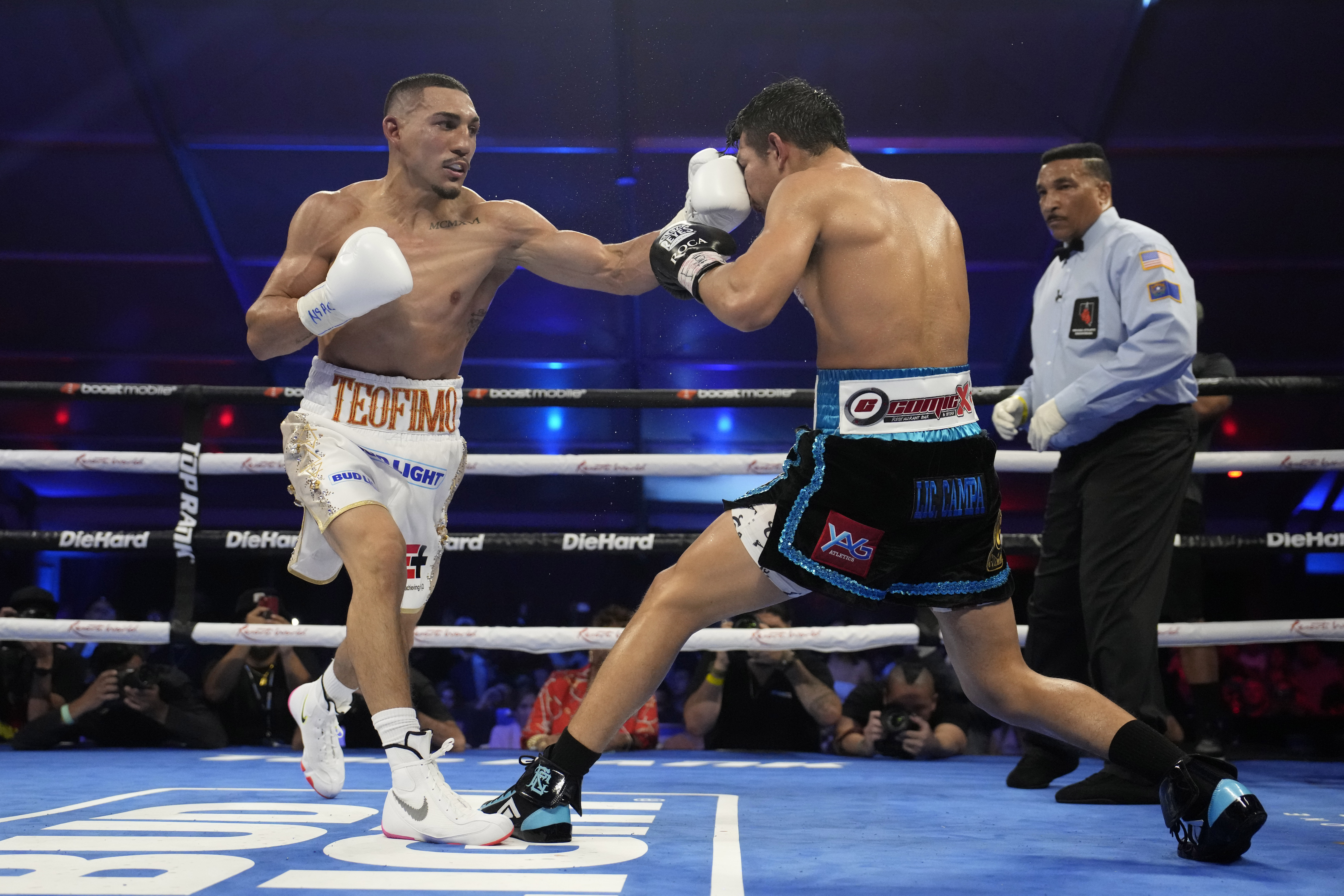 Teofimo Lopez hits Pedro Campa in a junior welterweight boxing match, Saturday, Aug. 13, 2022, in Las Vegas. 
