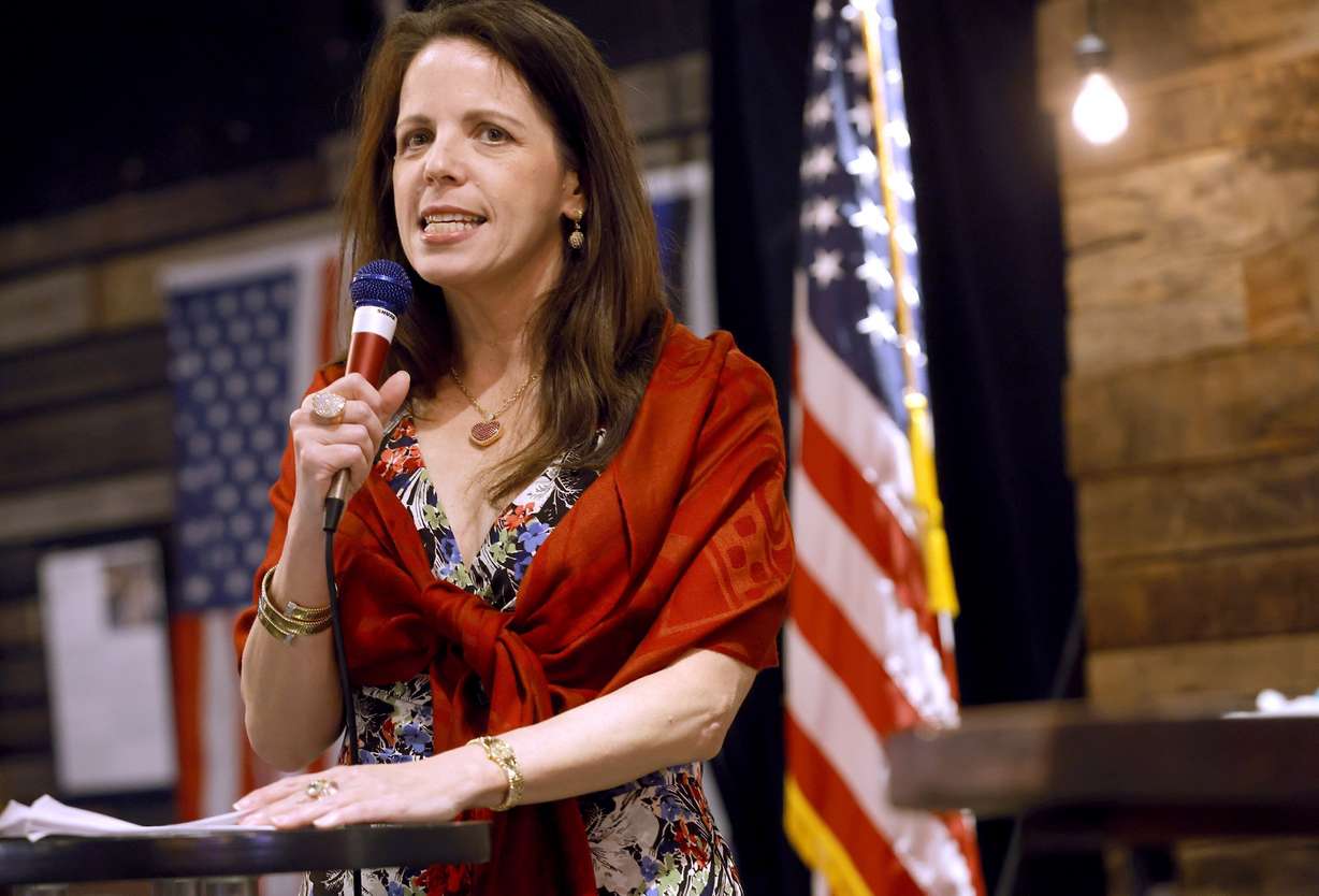 Dr. Simone Gold speaks to a large crowd during a Frontline Doctor's Uncensored Truth Tour event on June 30, 2021. Gold, an anti-vaccine medical doctor who pleaded guilty to illegally entering the Capitol, founded a nonprofit that raised more than $430,000 for her legal expenses.