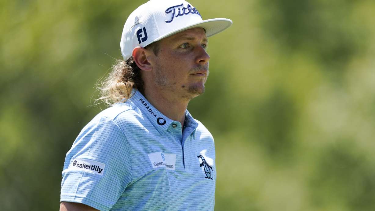 Cameron Smith, of Australia, walks off the sixth tee during the third round of the St. Jude Championship golf tournament, Saturday, Aug. 13, 2022, in Memphis, Tenn. (AP Photo/Mark Humphrey