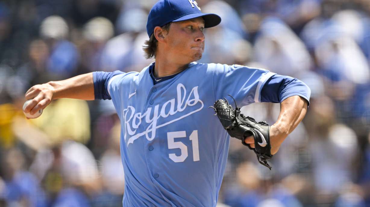 Kansas City Royals starting pitcher Brady Singer throws to a Los Angeles Dodgers batter during the first inning of a baseball game, Sunday, Aug. 14, 2022, in Kansas City, Mo.