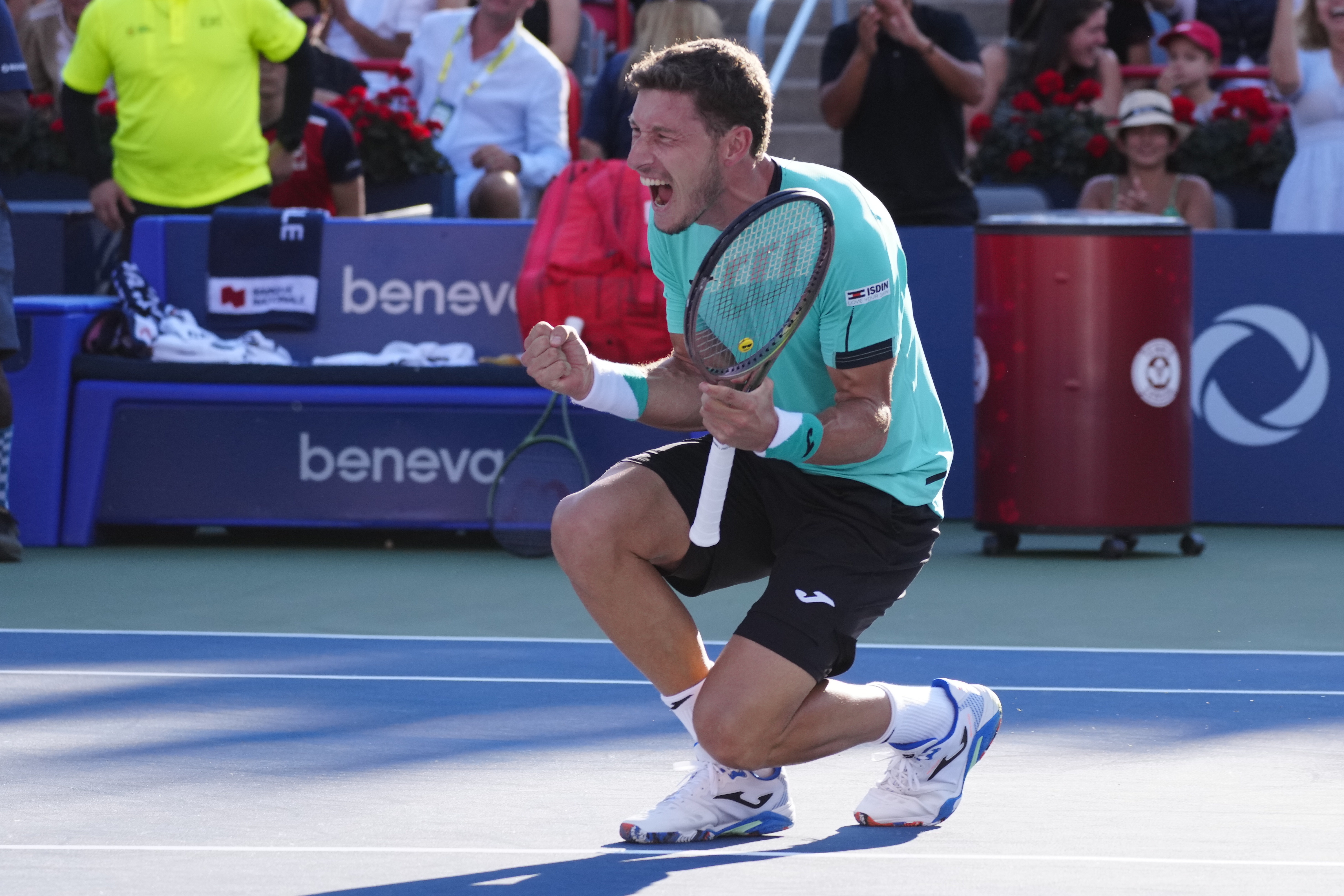 Pablo Carreno Busta, of Spain, reacts after defeating Hubert Hurkacz, of Poland, to win the final of the National Bank Open tennis tournament in Montreal, Sunday, Aug. 14, 2022. 