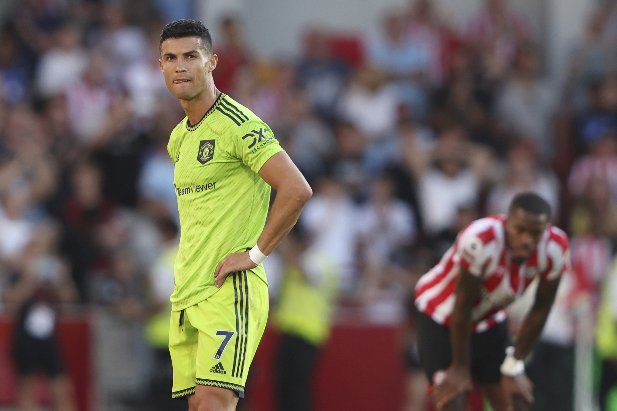 Manchester United's Cristiano Ronaldo looks round after the end of the English Premier League soccer match between Brentford and Manchester United at the Gtech Community Stadium in London, Saturday, Aug. 13, 2022. Manchester United lost 0-4 .