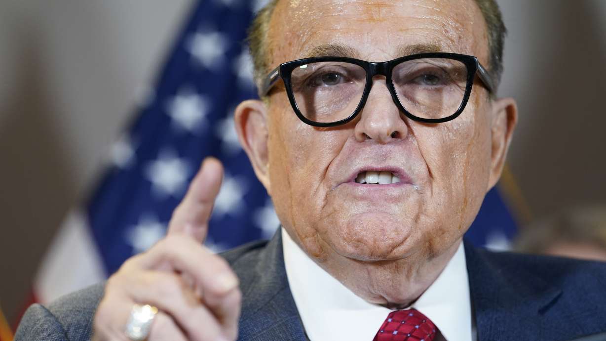 Former New York Mayor Rudy Giuliani, a lawyer for President Donald Trump, speaks at the Republican National Committee headquarters, Nov. 19, 2020, in Washington. Giuliani's lawyer says prosecutors in Atlanta have said Giuliani is a target of their criminal investigation into possible illegal attempts by Trump and others to interfere in the 2020 general election in Georgia.