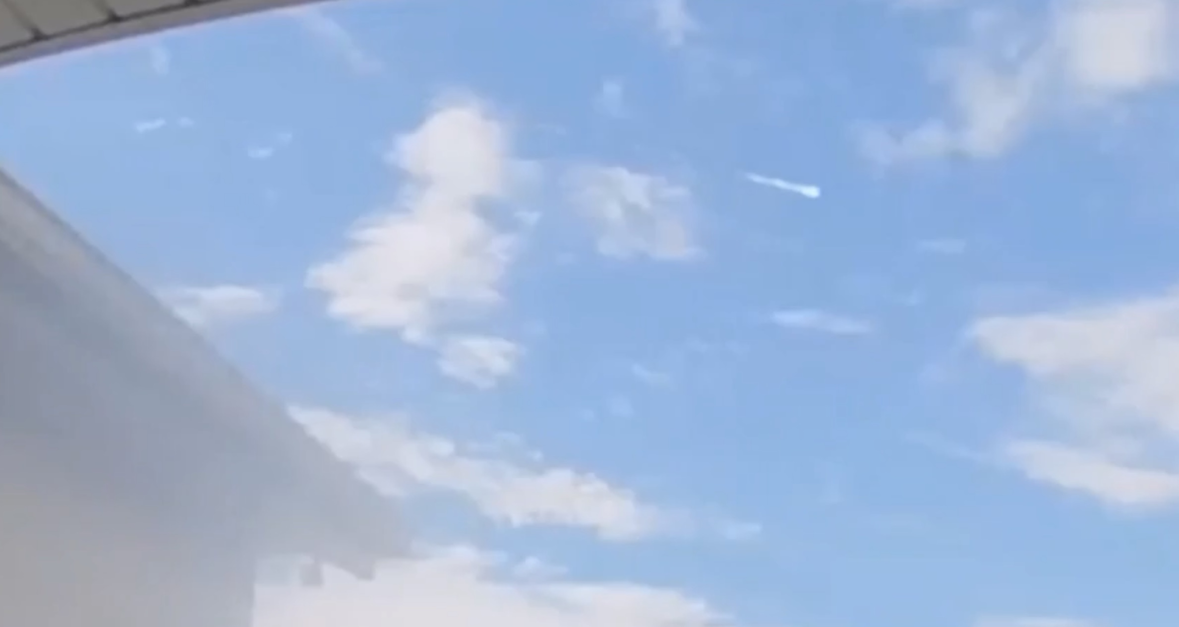 A screenshot from a doorbell camera captures a meteor streaking across the sky minutes before a boom Saturday morning.