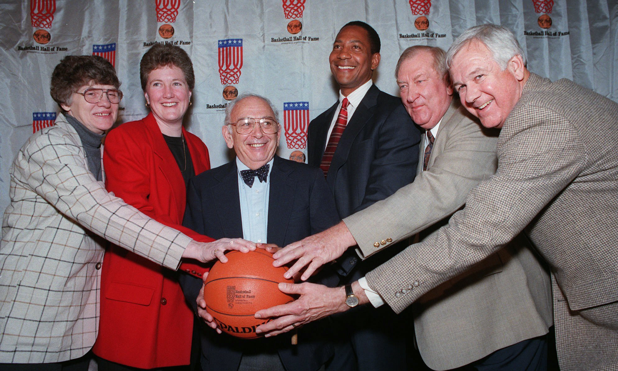 FILE - Inductees to the Basketball Hall of Fame pose at a news conference in New York, Feb. 4, 1997. From left are Joan Crawford of Nashville, Tenn.; Denise Curry of UCLA; Pete Carril of Princeton; Alex English of the Denver Nuggets; Don Haskins of UTEP; and Bailey Howell of the Detroit Pistons. Carril, the rumpled, cigar-smoking basketball coach who led Princeton to 11 appearances in the NCAA tournament, where his teams unnerved formidable opponents and rattled March Madness with old-school fundamentals, died Monday, Aug. 15, 2022. He was 92. 