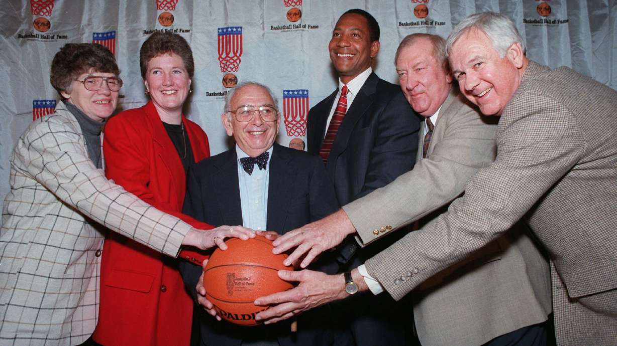 FILE - Inductees to the Basketball Hall of Fame pose at a news conference in New York, Feb. 4, 1997. From left are Joan Crawford of Nashville, Tenn.; Denise Curry of UCLA; Pete Carril of Princeton; Alex English of the Denver Nuggets; Don Haskins of UTEP; and Bailey Howell of the Detroit Pistons. Carril, the rumpled, cigar-smoking basketball coach who led Princeton to 11 appearances in the NCAA tournament, where his teams unnerved formidable opponents and rattled March Madness with old-school fundamentals, died Monday, Aug. 15, 2022. He was 92.