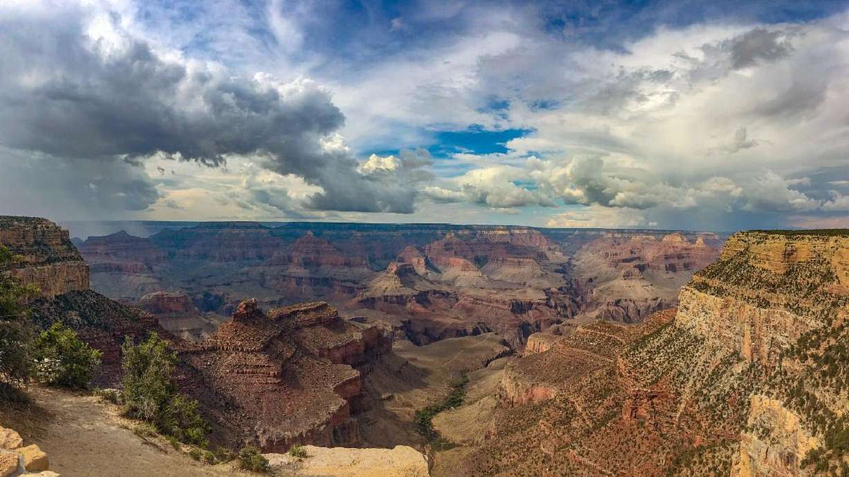 Summer rain showers pass over Grand Canyon Village at Grand Canyon National Park. The park has received nearly 5 inches of rain since the start of July.