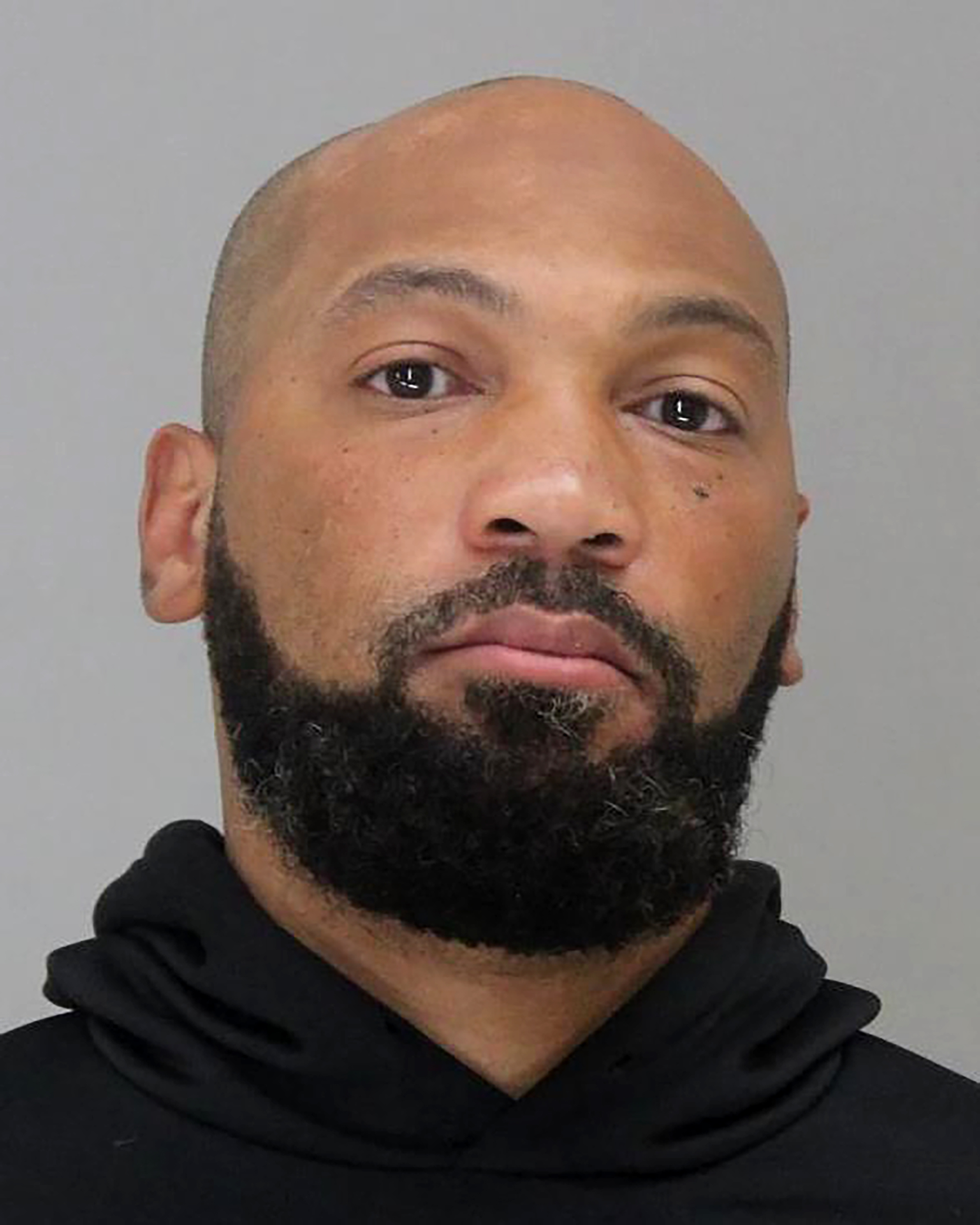 This booking photo released by the Dallas County Sheriff's Department, shows Yaqub Salik Talib on Monday, Aug. 15, 2022. Talib, the brother of retired NFL cornerback Aqib Talib, turned himself in to authorities Monday after police identified him as the suspect in the shooting death of a coach at a youth football game in Texas.  