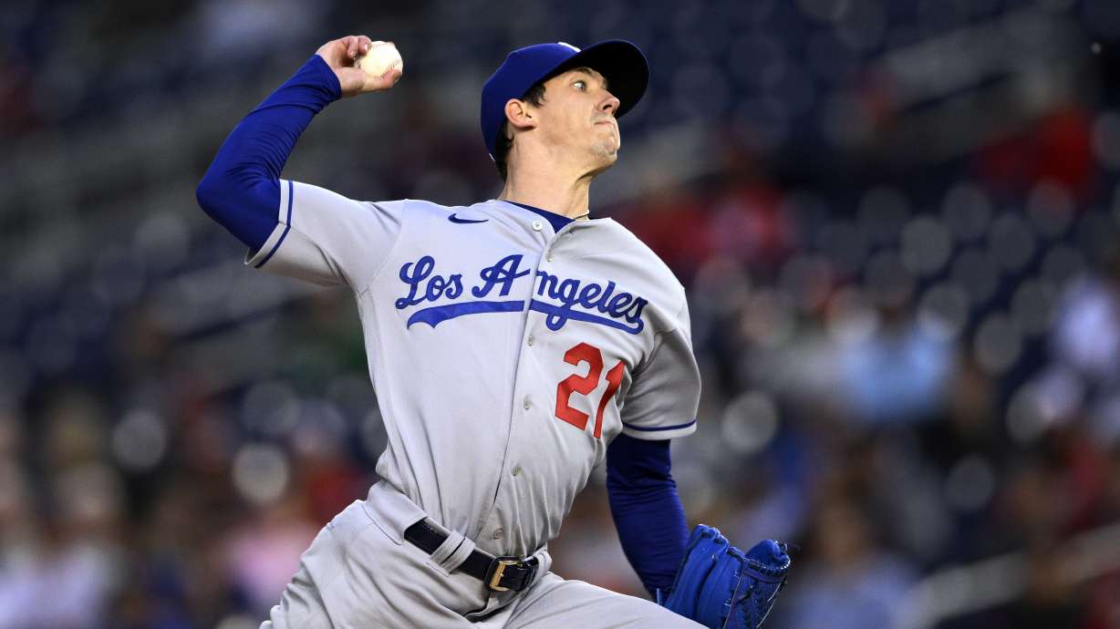 FILE - Los Angeles Dodgers starting pitcher Walker Buehler throws during the team's baseball game against the Washington Nationals on May 24, 2022, in Washington. Buehler will have season-ending surgery for the elbow injury that has prevented him from pitching for the last two months. The Dodgers announced Monday, Aug. 15, before the start of their four-game series with the Milwaukee Brewers that that Buehler's surgery is scheduled for Aug. 23.