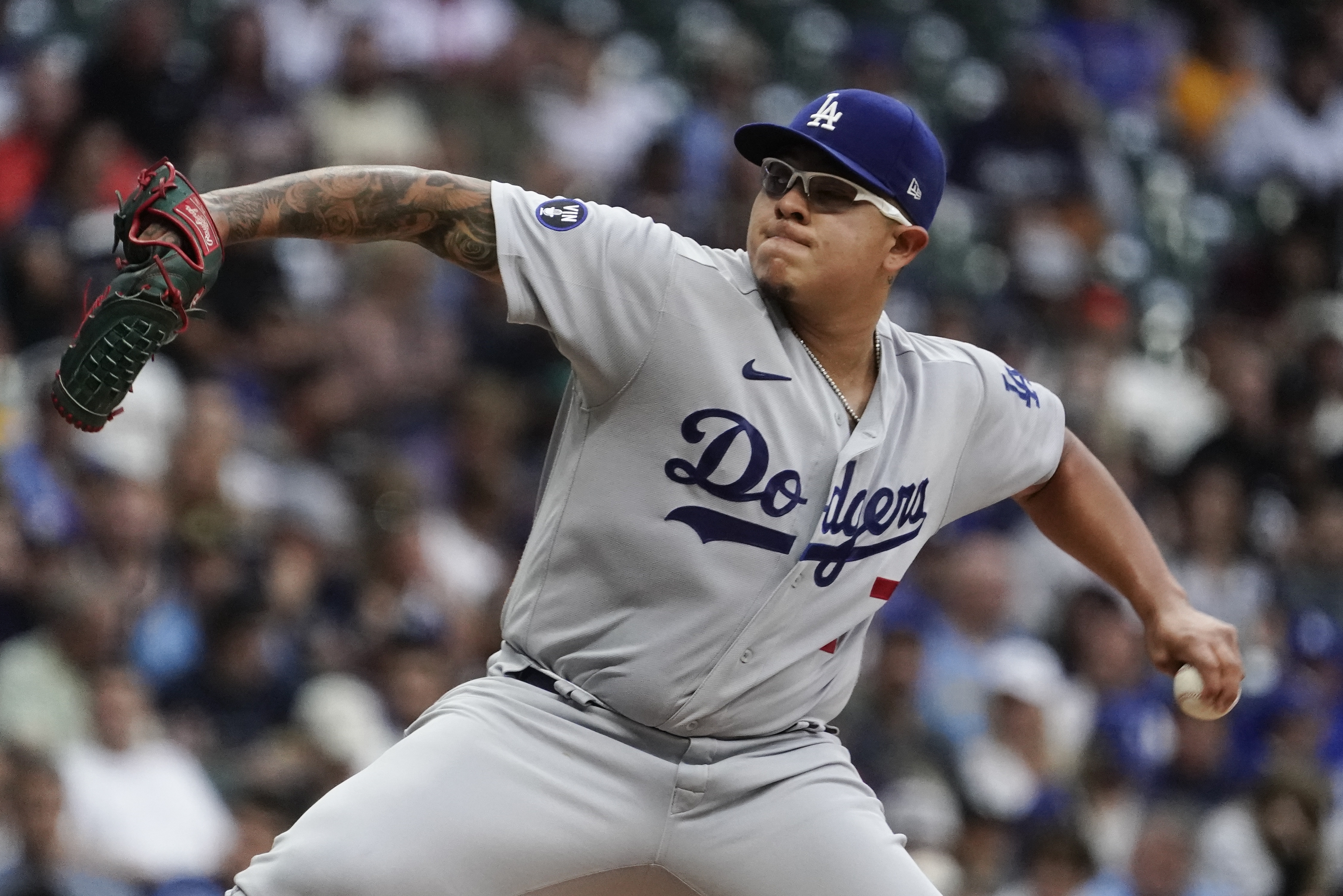 Los Angeles Dodgers starting pitcher Julio Urias throws during the first inning of a baseball game against the Milwaukee Brewers Monday, Aug. 15, 2022, in Milwaukee. 