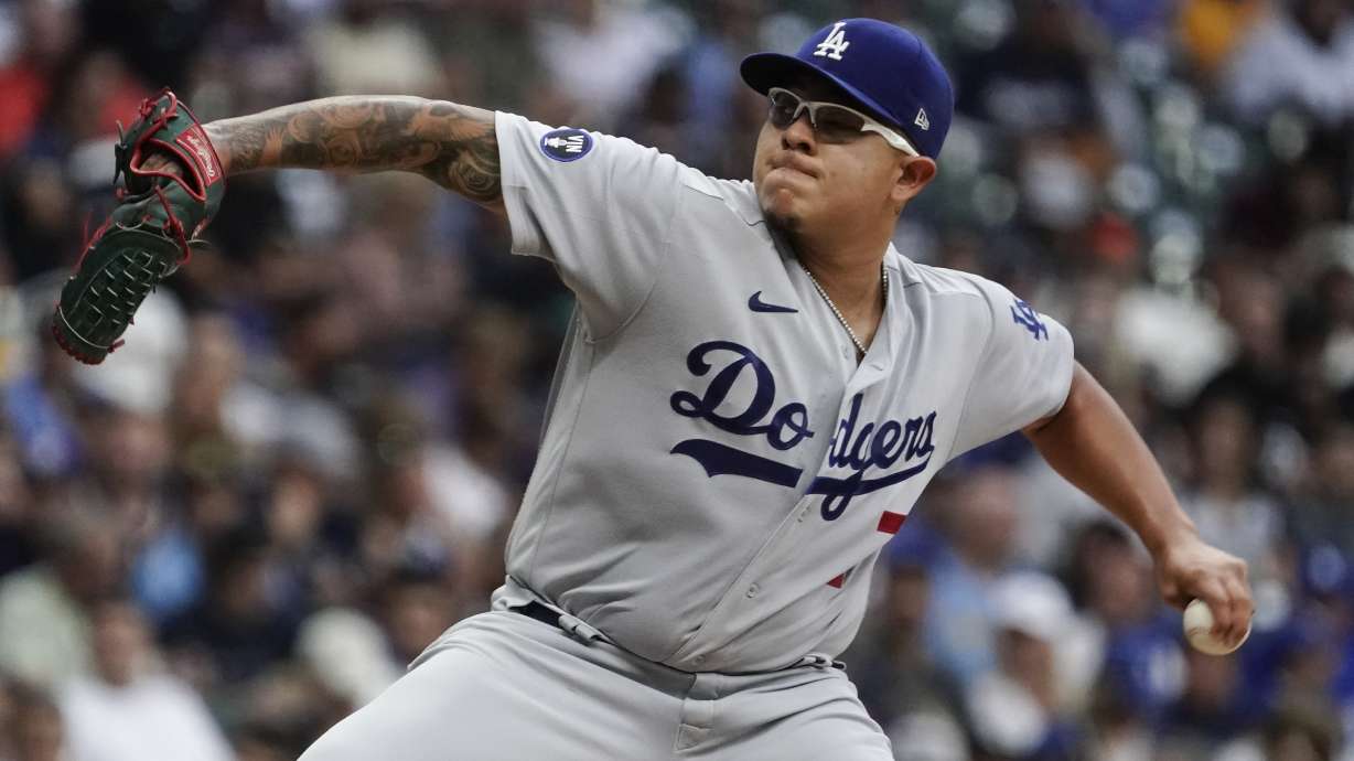 Los Angeles Dodgers starting pitcher Julio Urias throws during the first inning of a baseball game against the Milwaukee Brewers Monday, Aug. 15, 2022, in Milwaukee.