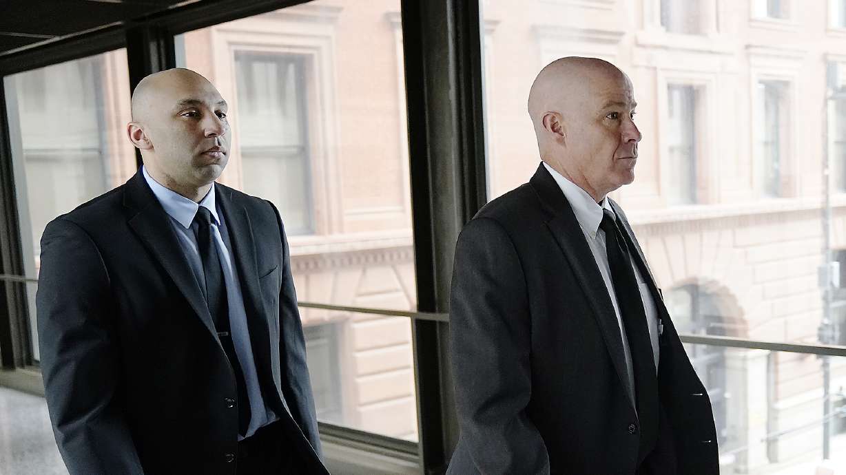 Former Minneapolis police officer J. Alexander Kueng, left, and his attorney Thomas Plunkett arrive for sentencing for violating George Floyd's civil rights outside the Federal Courthouse July 27 in St. Paul, Minn. Kueng pleaded guilty to aiding and abetting second-degree manslaughter just as jury selection was about to begin