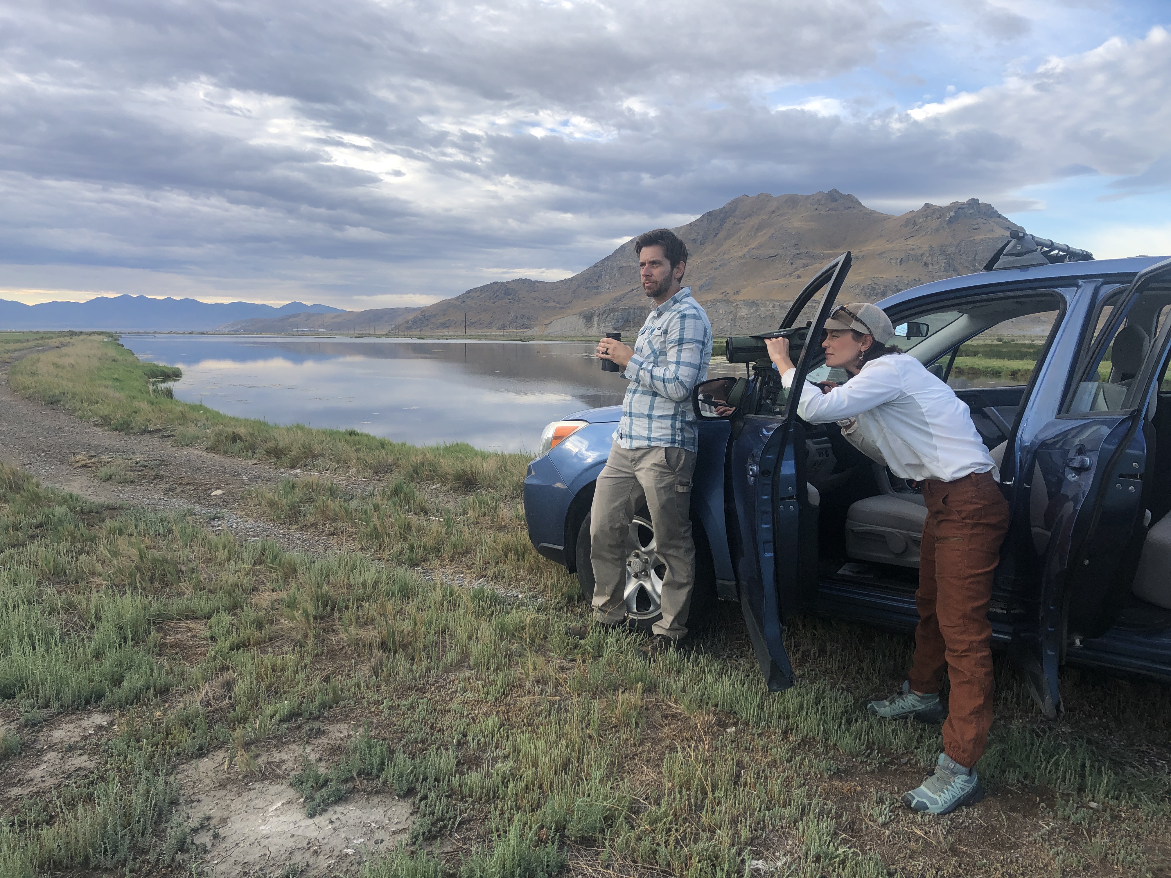 Sageland Collaborative executive director Josh Wood, left, and Sageland Collaborative ecologist Janice Gardner, scope out shorebirds at Timpie Springs Waterfowl Management Area in Tooele County on Aug. 12.