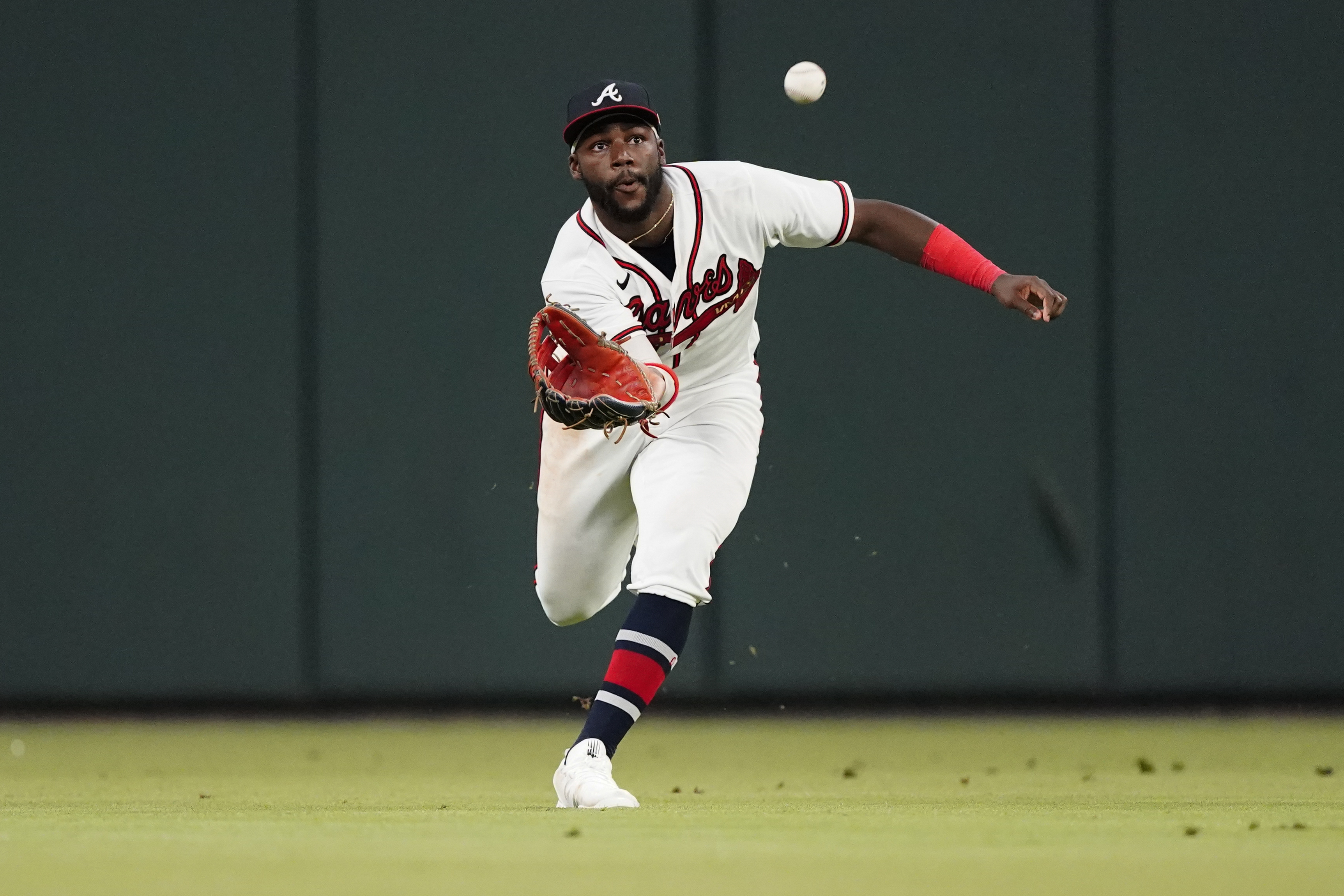 Atlanta Braves center fielder Michael Harris II (23) makes a running catch on a fly ball from New York Mets Jon Berti in the eighth inning of a baseball game against the New York Mets Monday, Aug. 15, 2022, in Atlanta. 