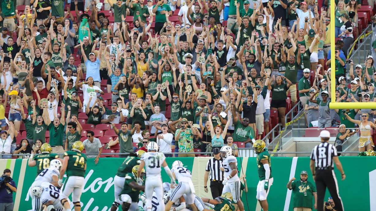 University of South Florida fans celebrate a rushing touchdown in the Bulls victory over BYU in Tampa, Florida on Oct. 12, 2019.