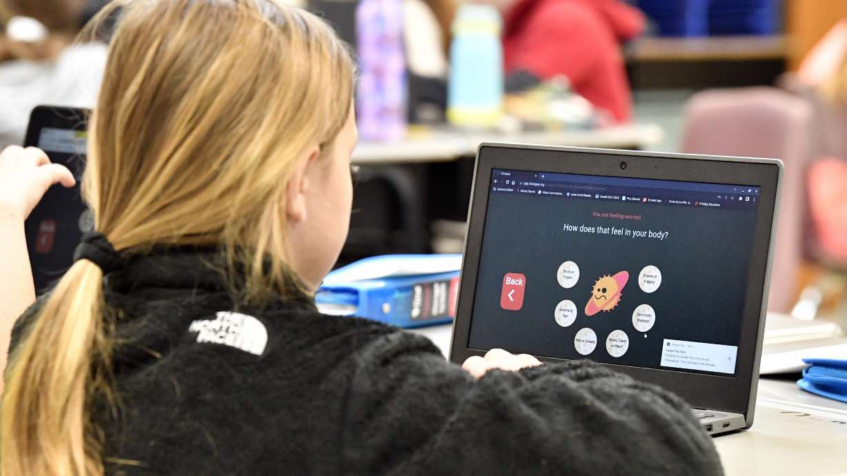 A student at Lakewood Elementary School in Cecilia, Ky., uses her laptop to participate in an emotional check-in at the start of the school day, Thursday. The rural Kentucky school is one of thousands across the country using the technology to screen students' state of mind and alert teachers to anyone struggling.