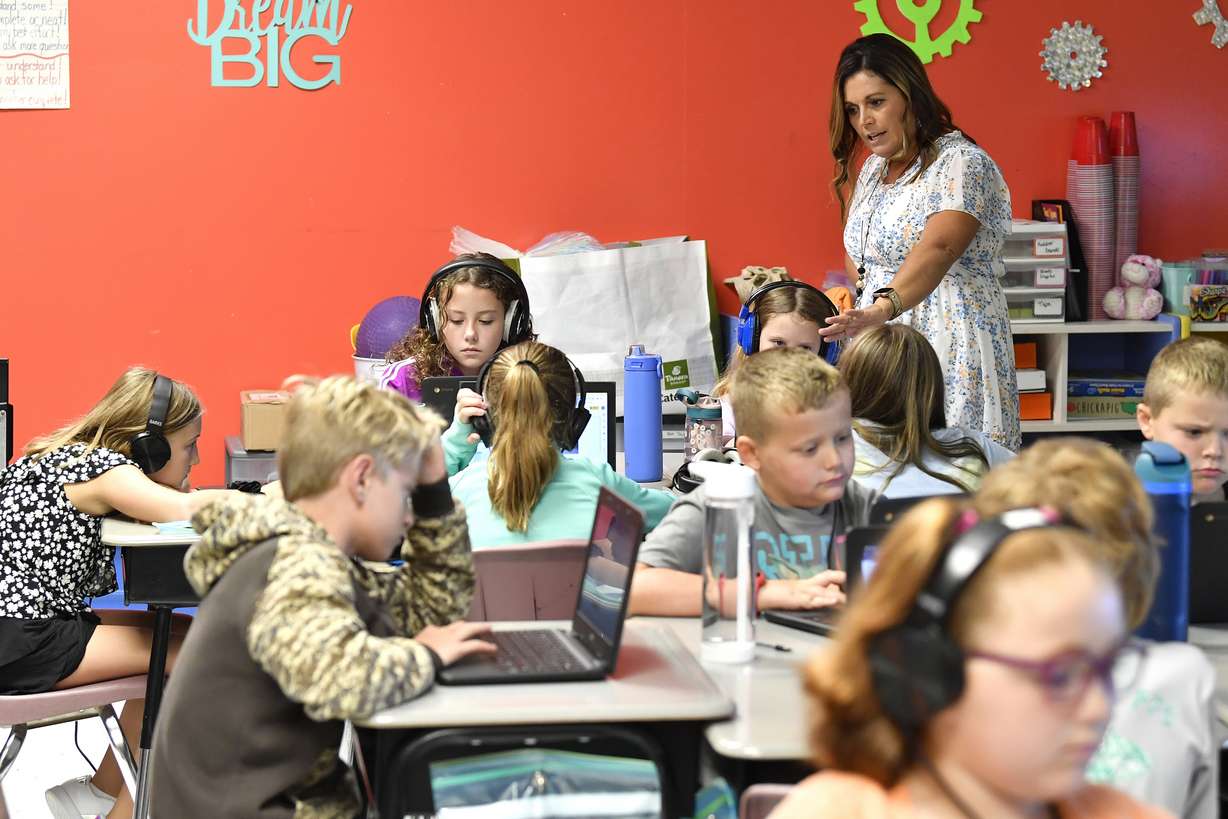 Angela Pike watches her fourth grade students at Lakewood Elementary School in Cecilia, Ky., as they use their laptops to participate in an emotional check-in at the start of the school day, Thursday. The rural Kentucky school is one of thousands across the country using the technology to screen students' state of mind and alert teachers to anyone struggling.