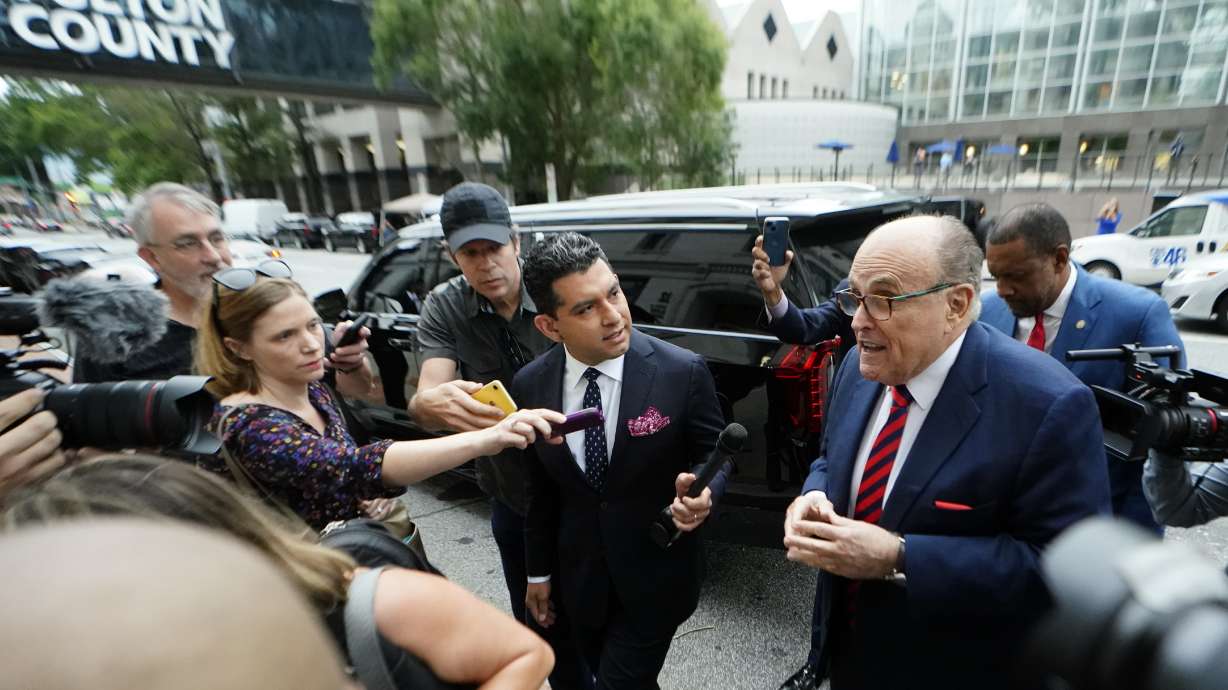 Rudy Giuliani arrives at the Fulton County Courthouse on Wednesday in Atlanta. Giuliani is scheduled to testify before a special grand jury that is investigating attempts by former President Donald Trump and others to overturn his 2020 election defeat in Georgia.
