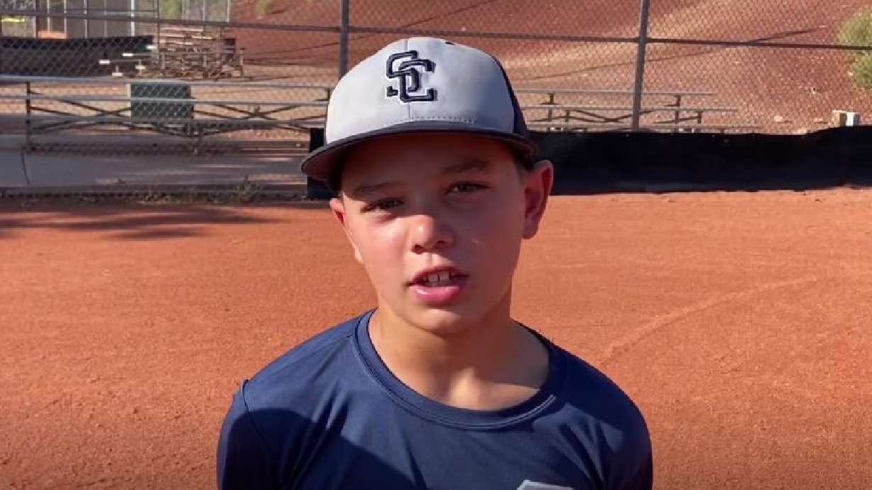 Easton Oliverson, a member of the Snow Canyon Little League all-star team, during a team introduction at practice, St. George, July 28. His family said Wednesday his breathing tube has been removed after he was seriously injured falling from a bunk bed.