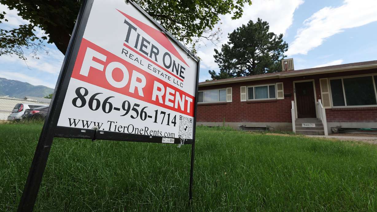 A home for rent in Sandy is pictured on July 12. Even though the housing market has cooled and homebuilders are saying the market has entered a recession, home prices are still high — and are still putting pressure on rental prices.