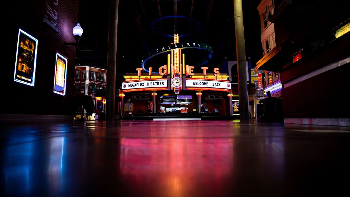 The ticket booth is illuminated at the Megaplex Theatres at Jordan Commons in Sandy on March 11, 2021. Moviegoers are not going to R-rated movies as they have in the past, new analysis shows.