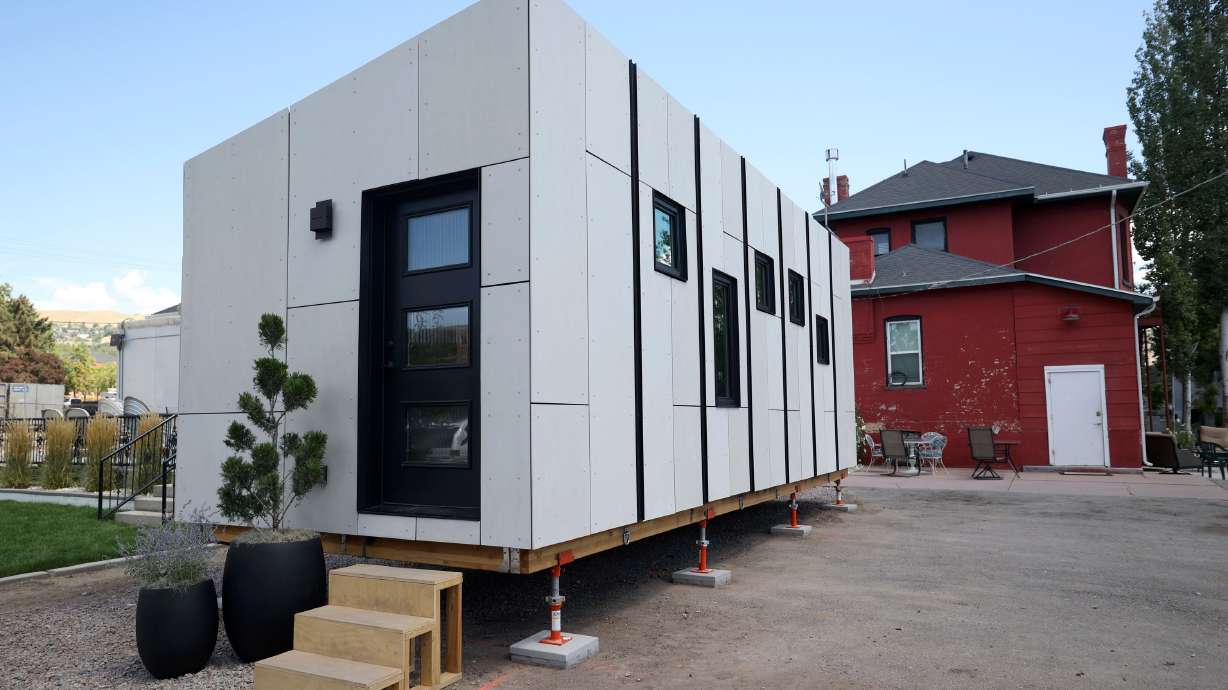 A 280-square-foot cottage that will be part of the Other Side Village, providing affordable, permanent housing for people coming out of chronic homelessness, is pictured in Salt Lake City on Aug. 16. It was designed and constructed as part of the University of Utah School of Architecture's Design + Build Salt Lake program. The first phase of the village will have 60 and eventually grow to 430 tiny homes.
