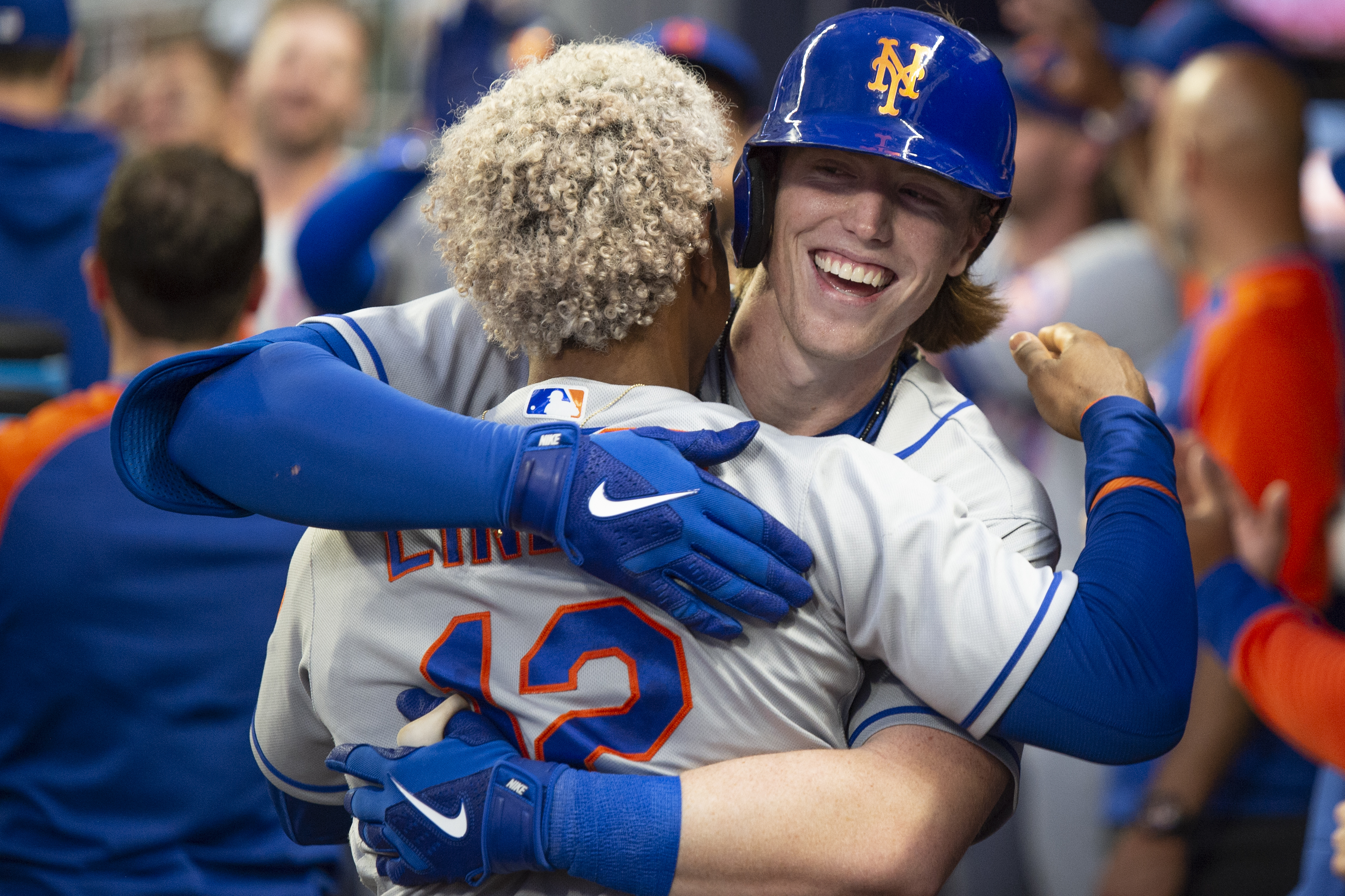 New York Mets' Francisco Lindor, back to camera, celebrates with Brett Baty, who hit a two-run home run against the Atlanta Braves during the second inning of a baseball game Wednesday, Aug. 17, 2022, in Atlanta.