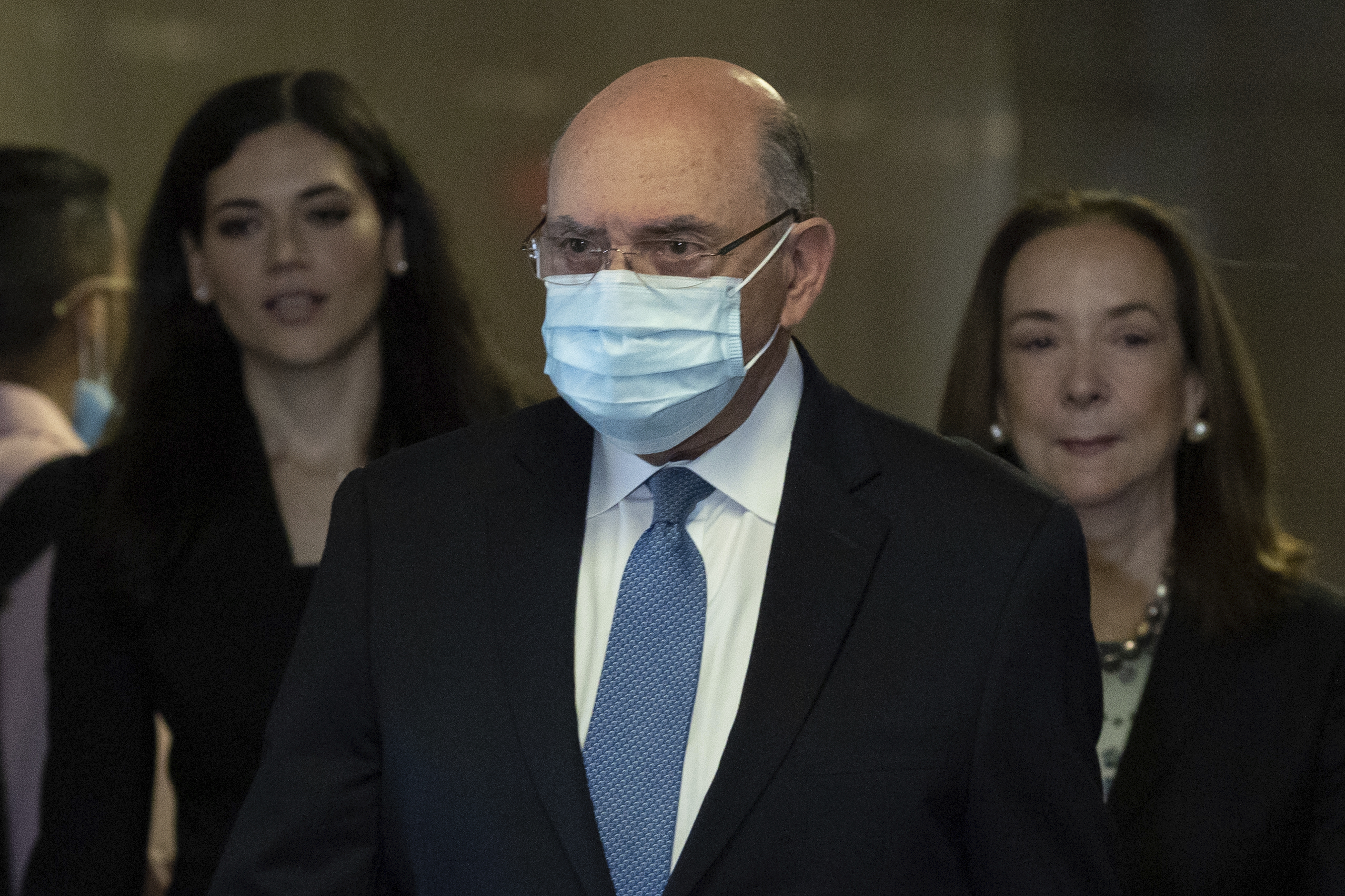 The Trump Organization's former Chief Financial Officer Allen Weisselberg arrives at court, Thursday, in New York. Weisselberg is charged with accepting more than $1.7 million in off-the-books compensation from the former president's company over several years, including untaxed perks like rent, car payments and school tuition.